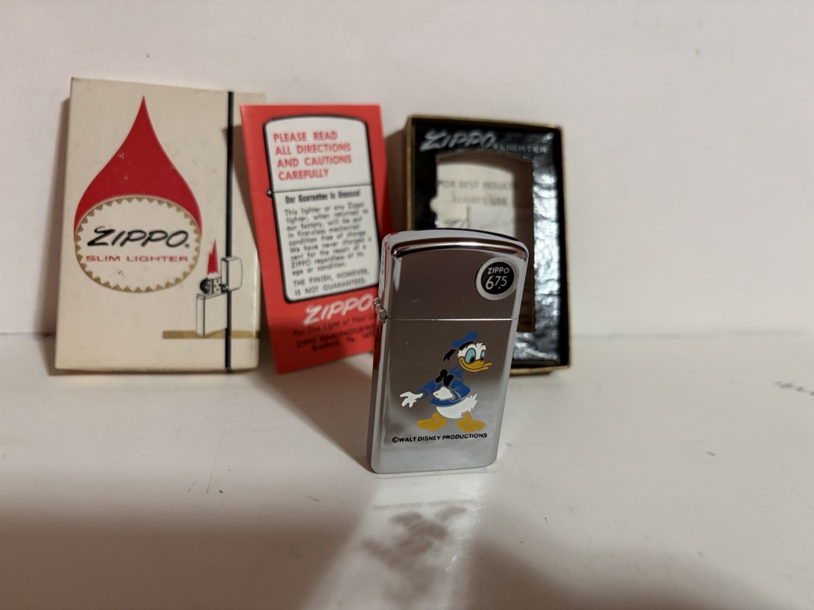 DONALD DUCK 1975 VINTAGE ZIPPO LIGHTER BRADFORD PA. NEW IN BOX W/ALL PAPERWORK