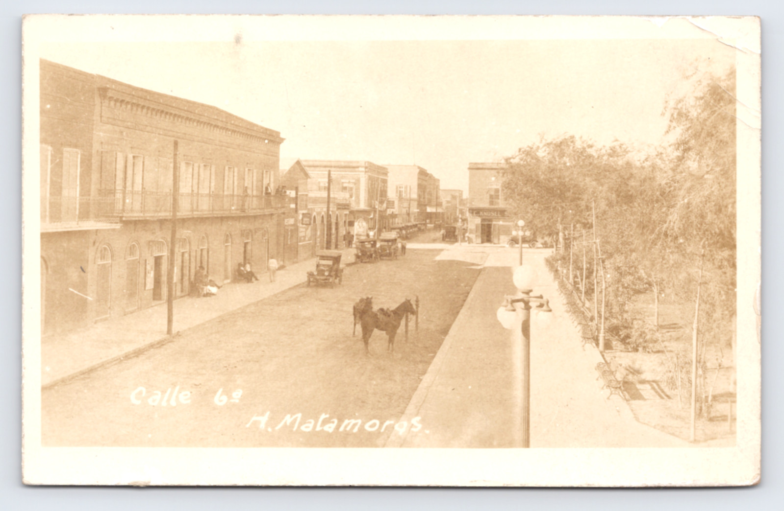 c1920 Calle 6a Street Scene H Matamoros Mexico RPPC Monte Carlo Cafe Beer Sign