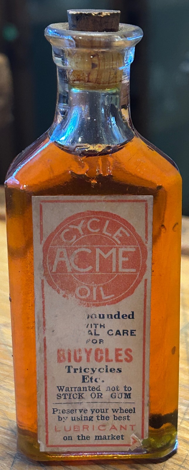 RARE 1890\'S ACME CYCLE BICYCLE TRICYCLE OIL FULL CORK BOTTLE 3ii 2 OUNCE SIZE