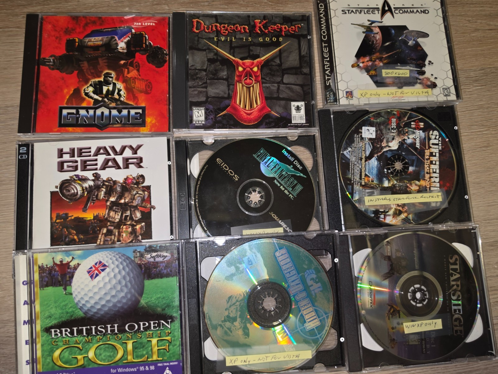 9 CD-ROM STAR TREK , DUNGEON KEEPER, STAR SIEGE, HEAVY GEAR, BRITISH OPEN GOLF