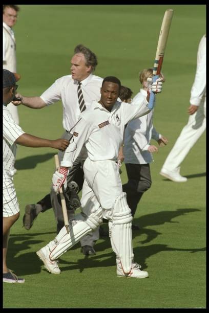 Brian Lara of Warwickshire after scoring a World Record 501 not ou- Old Photo