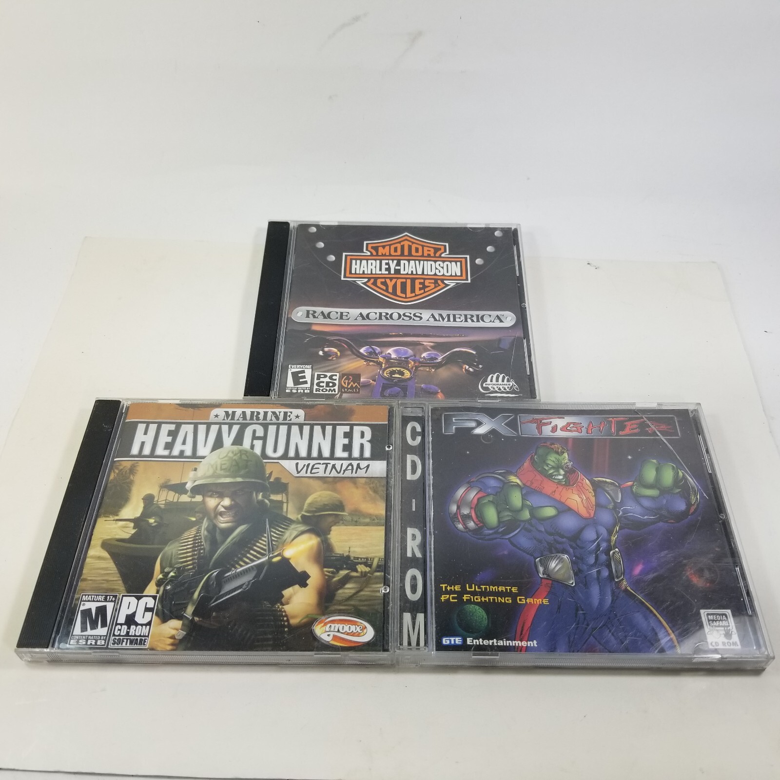 Lot of 3x Games Harley Race Across America, Marine Heavy Gunner, FX Fighter (PC)