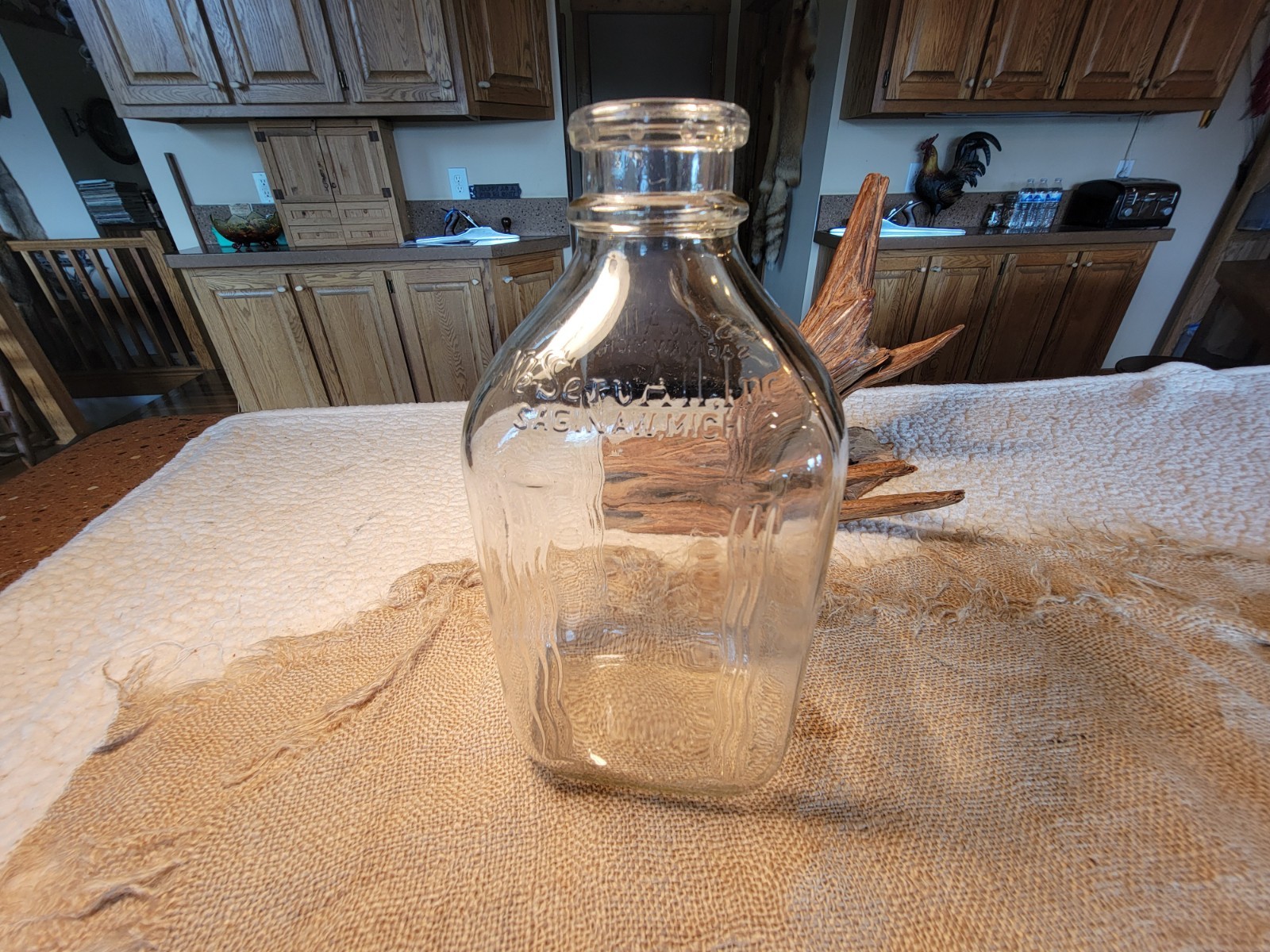 VINTAGE We Serve All Half Gal. Milk Bottle Saginaw Michigan