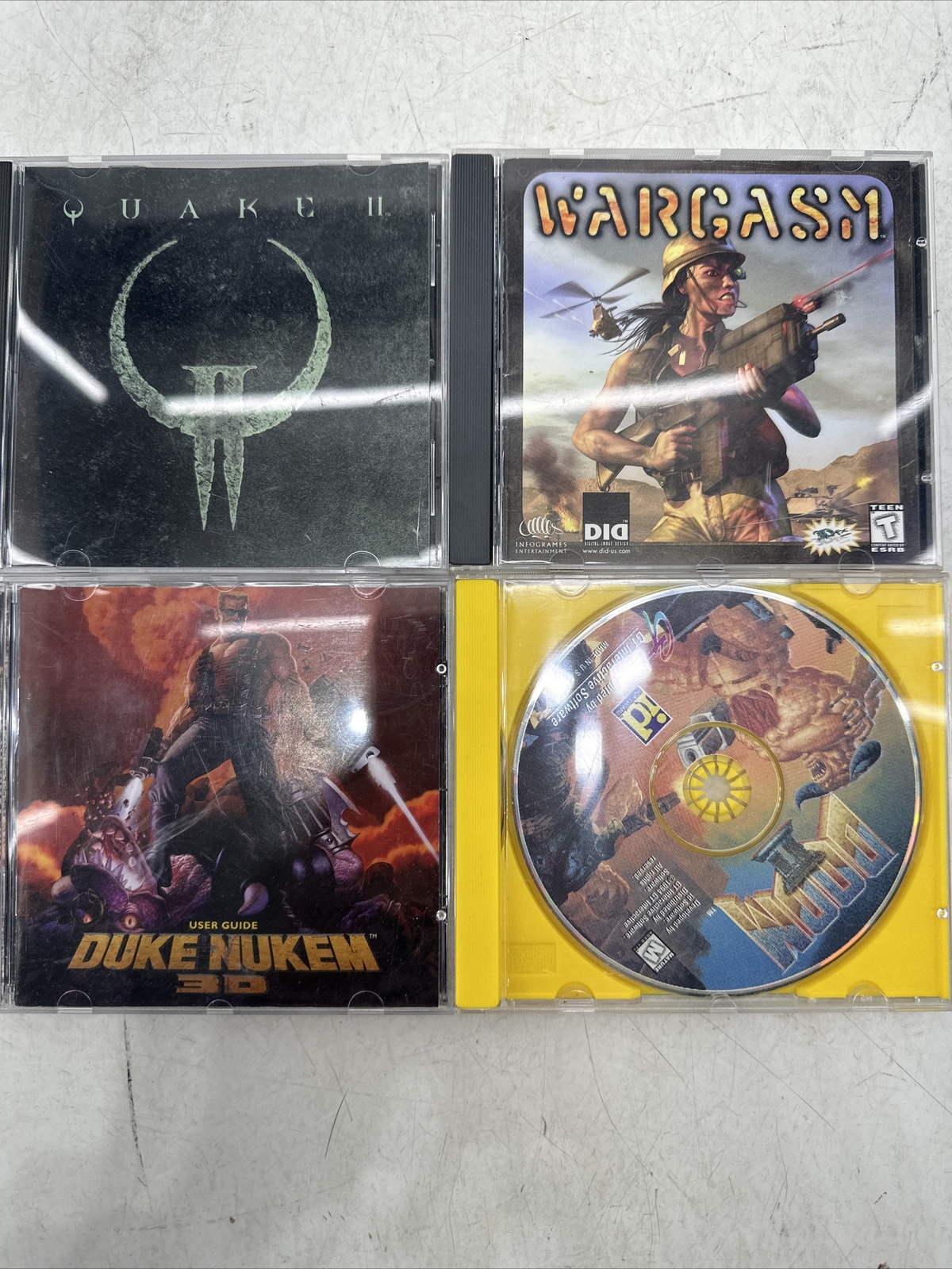 Lot of 4 Windows PC Games Doom 2 Duke Nikes 3D, Quake 2, Wargasm