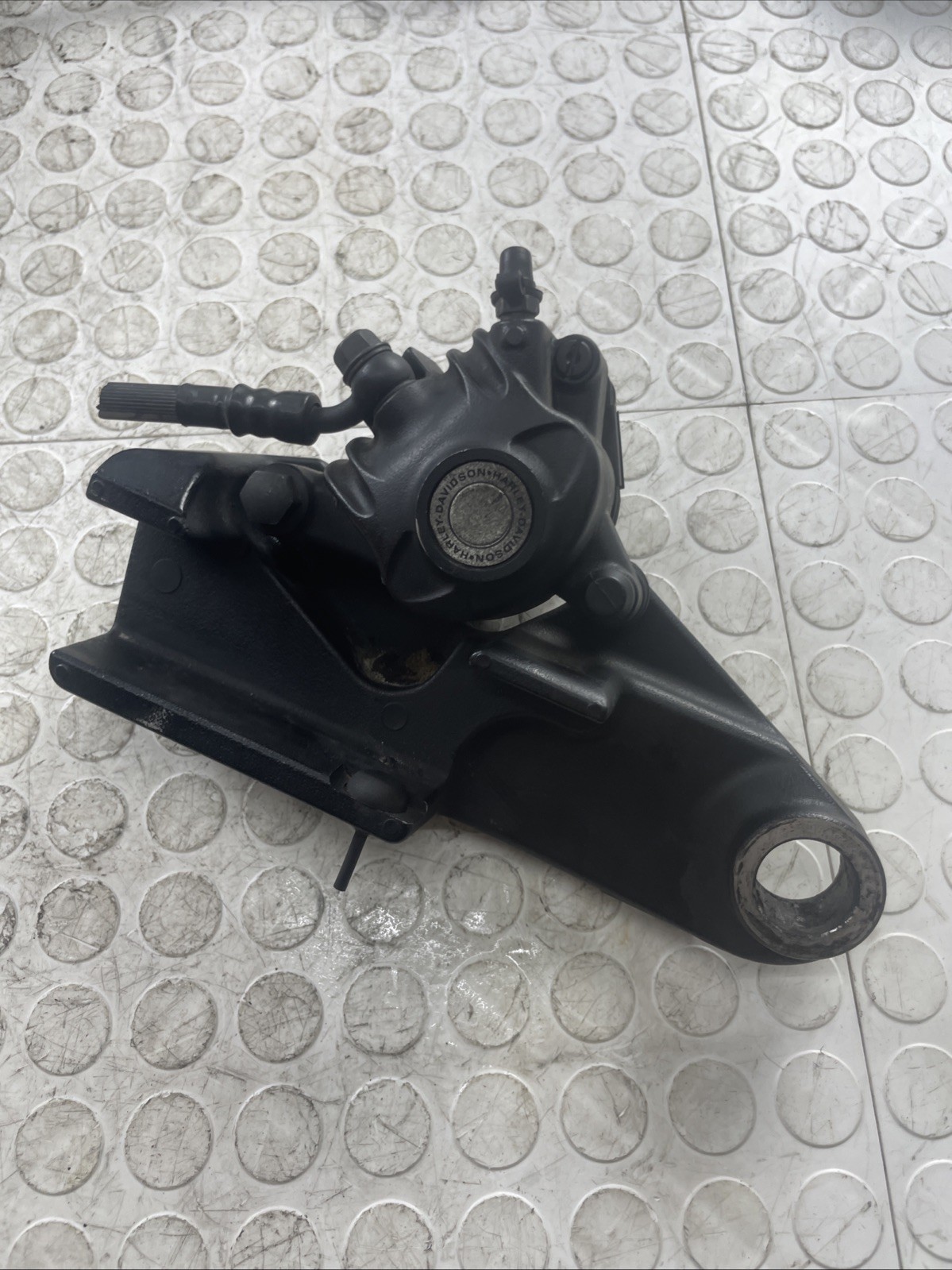 Genuine rear brake caliper for 2006 Harley-Davidson XL883R (carburetor) OEM