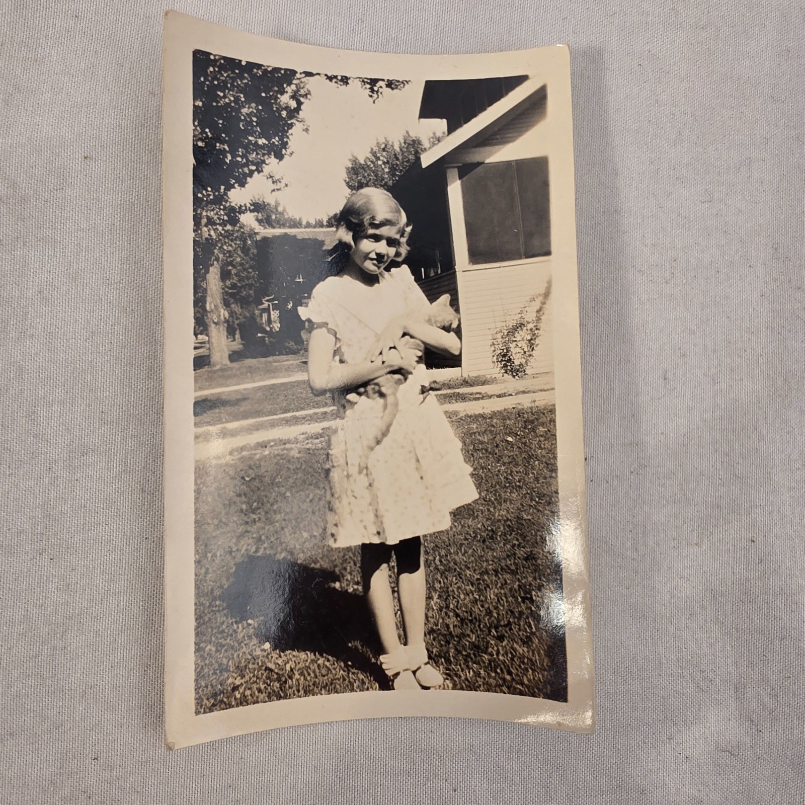 Vintage 1930s 1940s Snapshot Photo Little Girl Holding Puppy Dog Outside House