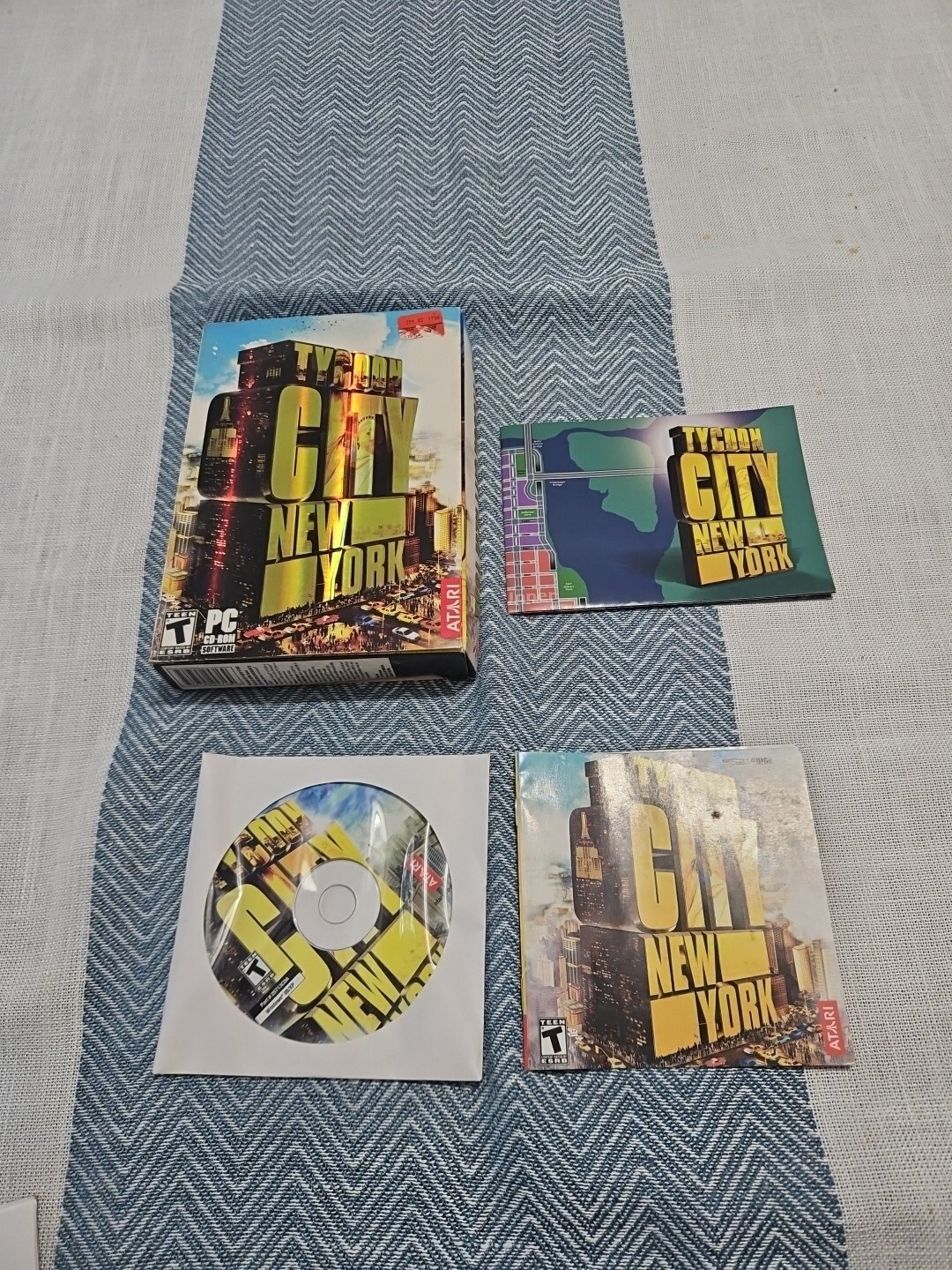 Tycoon City: New York (PC, 2006) box has some shelf wear