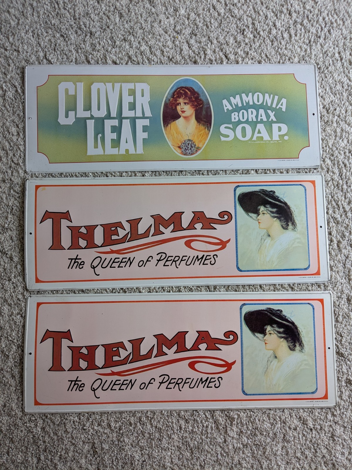 VTG 70s 2 Thelma the Queen of Perfumes & 1 Clover Leaf Embossed Tin Sign USA