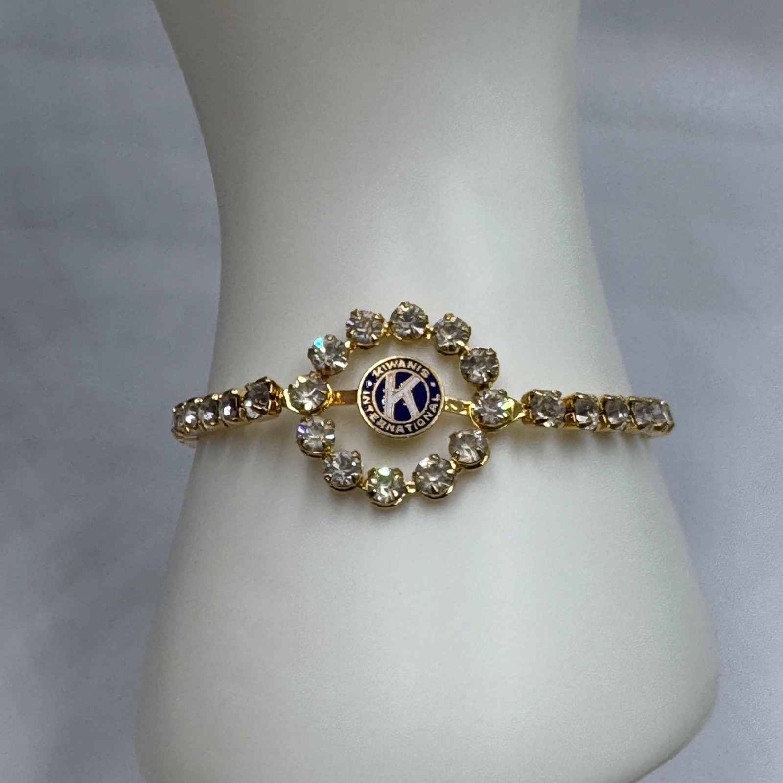 Vintage Kiwanis International Gold Tone Rhinestone Bracelet Blue Enamel Logo