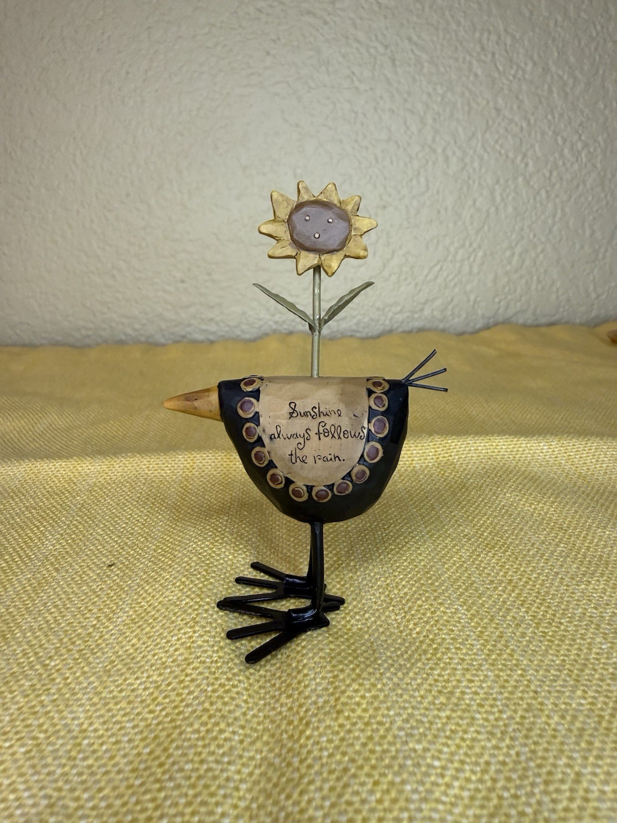 Blossom Bucket B Lloyd ‘06 Crow/Sunflower “Sunshine always follows the Rain”