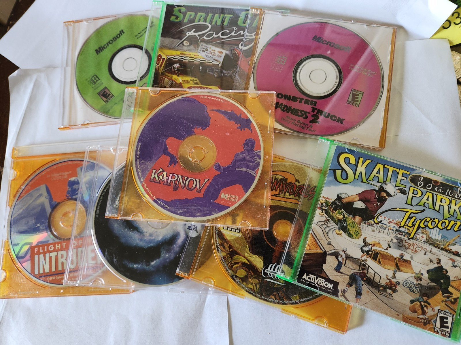 8 PC Games Sprint Car Racing Karnov Skate Park Tycoon Motocross Carnivores plus 