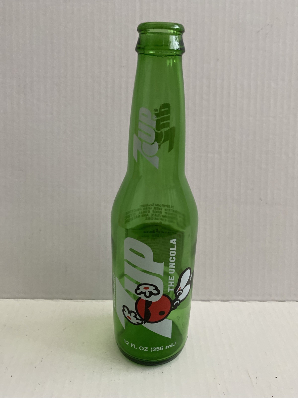 7 UP Cool Spot Vintage Bottle Green