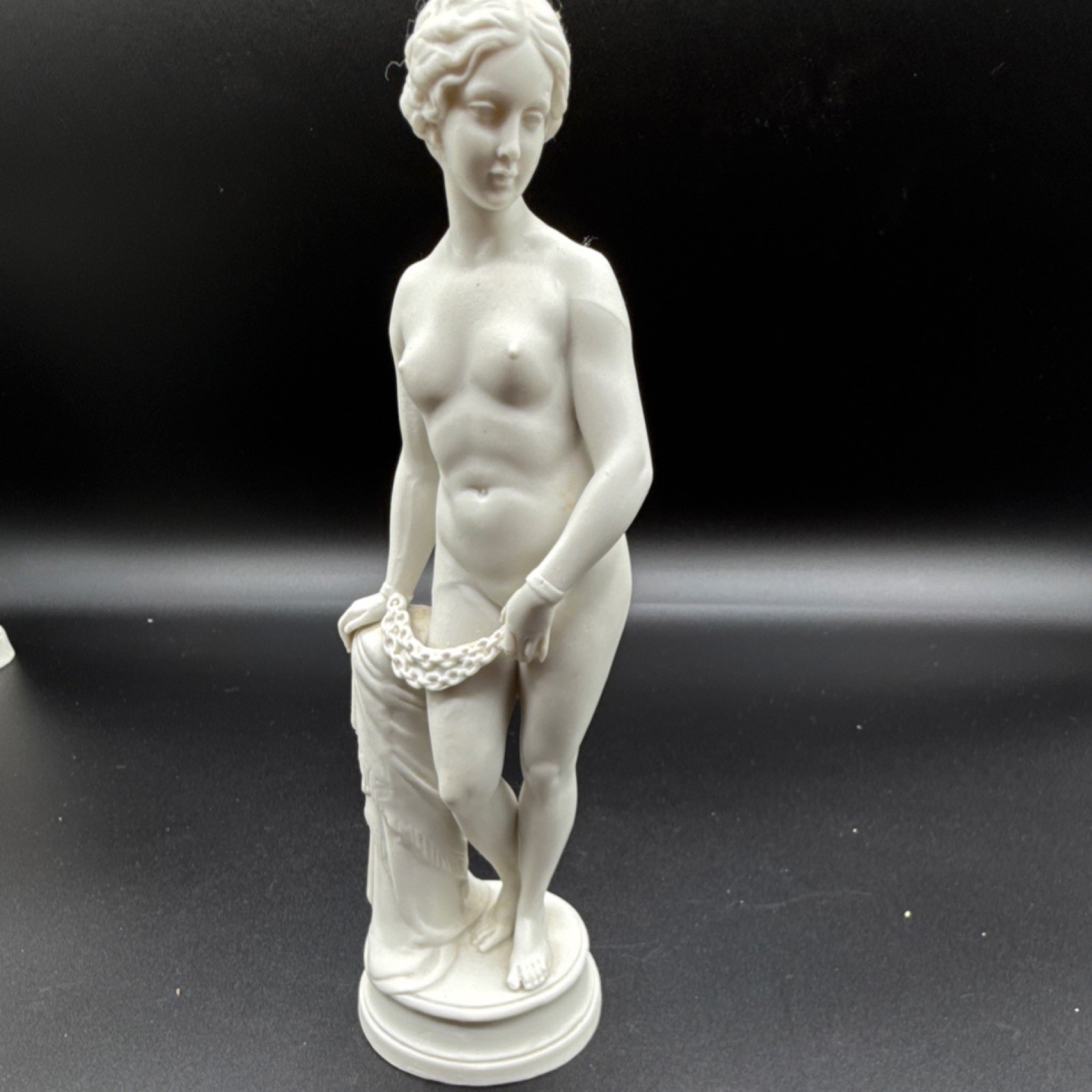Porcelain figurine titled 'The Greek Slave' after Hiram Powers