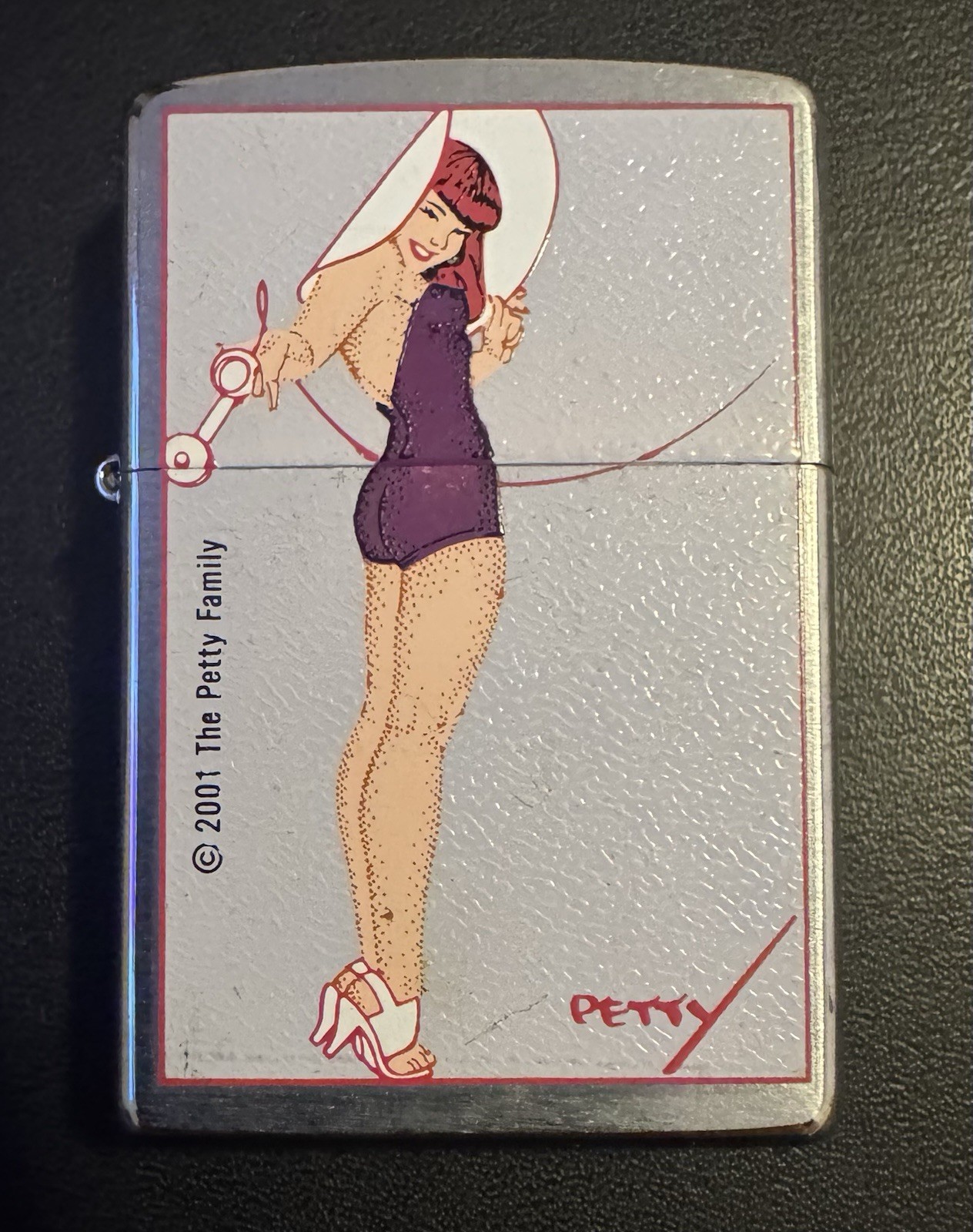 Vintage Retired Zippo Lighter 2000 The Petty Family Purple Dress Women