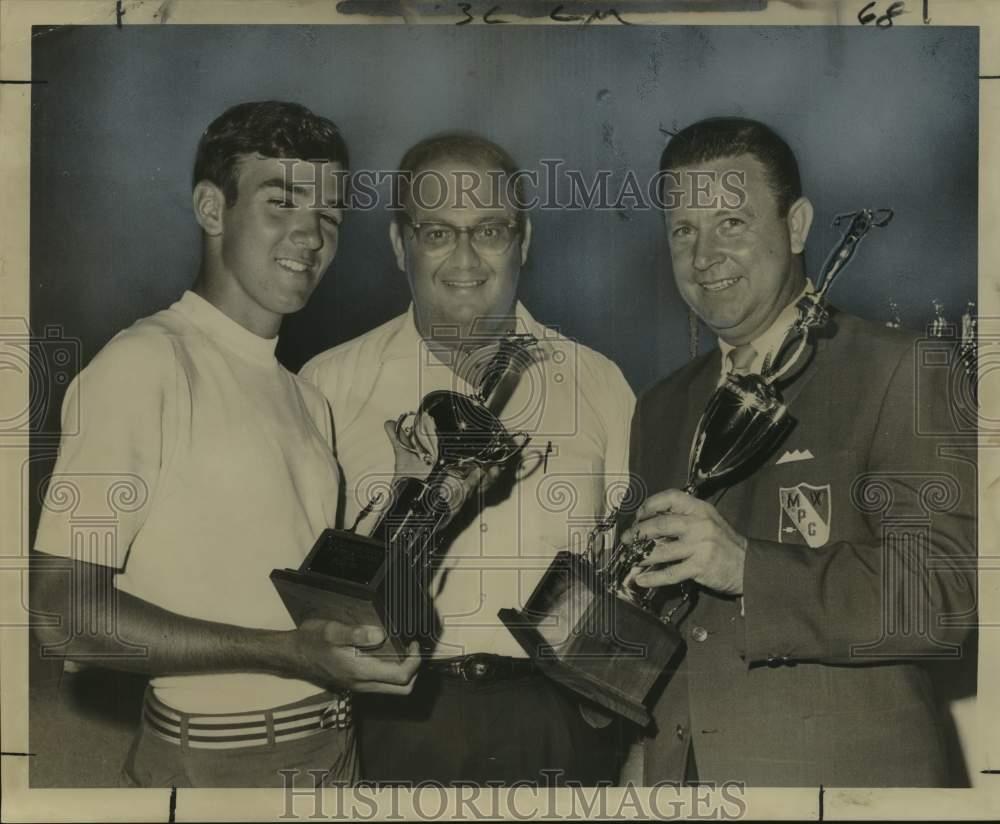 1965 Press Photo Larry Miller presented with trophy for winning golf tourney