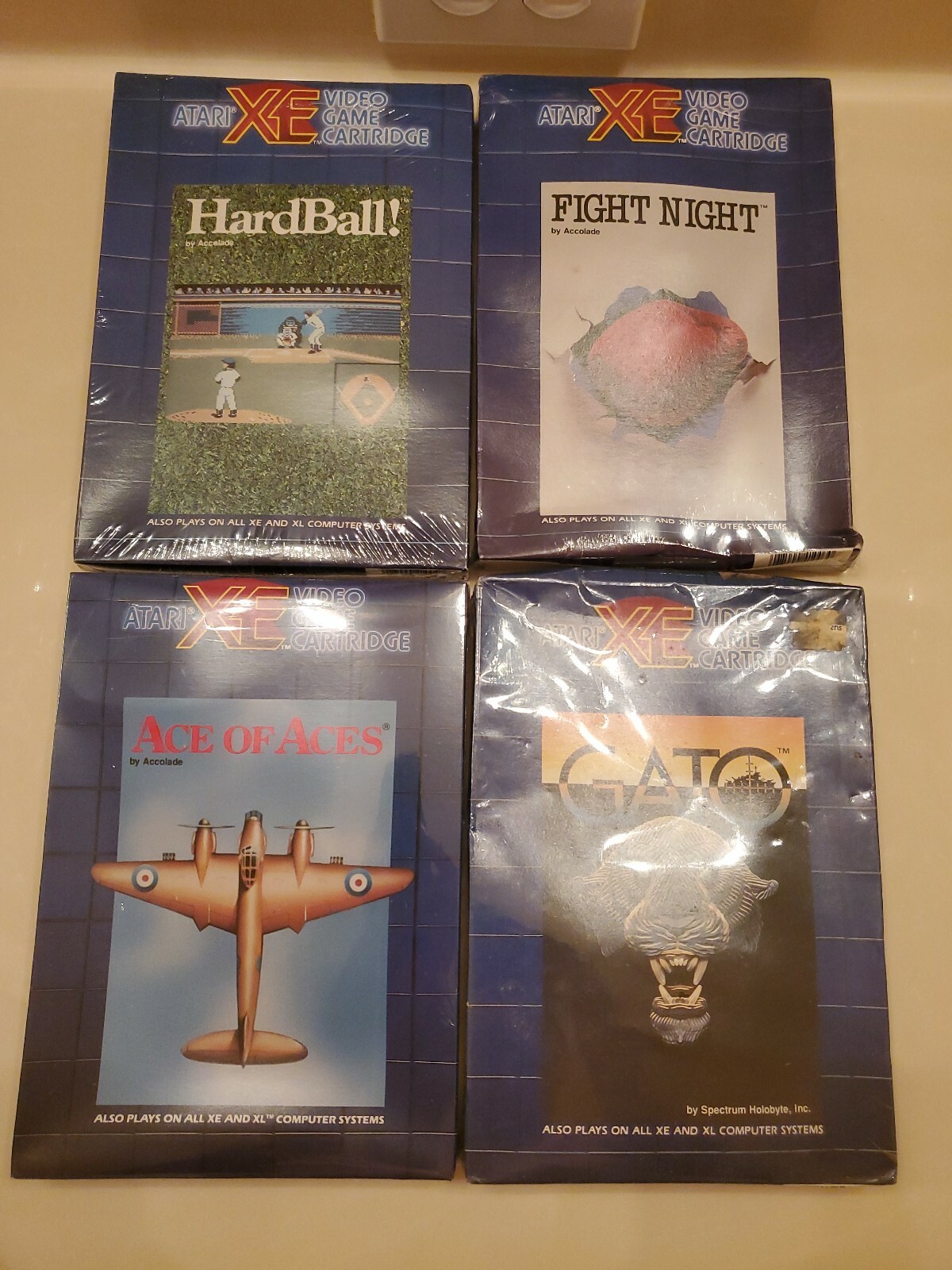 Atari XEGS XE GAME SYSTEM 4 BRAND NEW FACTORY SEALED GAMES GATO ACE FIGHT NIGHT 