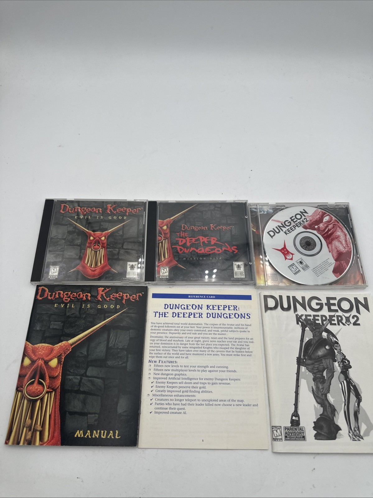 (3) Dungeon Keeper games: Evil is Good, Keeper 2 and Deeper Dungeons W/ Manuals