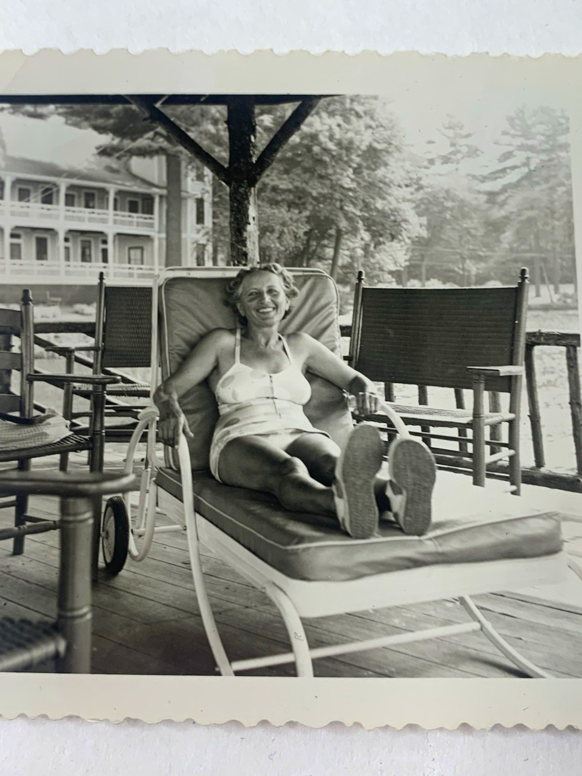B&W snapshot photo 1960s lady swimsuit vacay happy summer relax