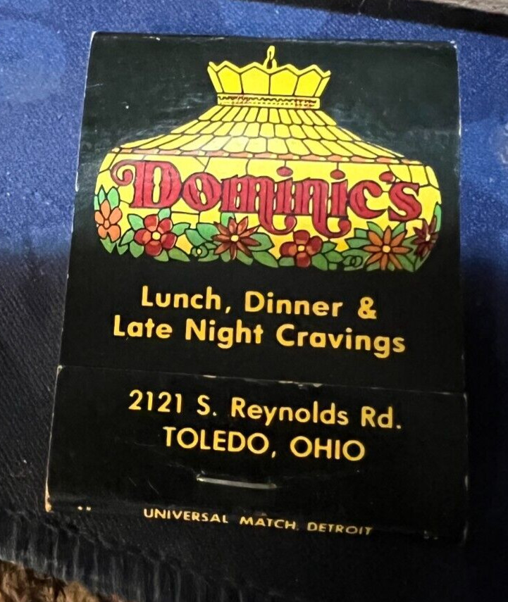 MATCHBOOK COVER-----DOMINIC\'S-----2121 SOUTH REYNOLDS ROAD------TOLEDO OHIO