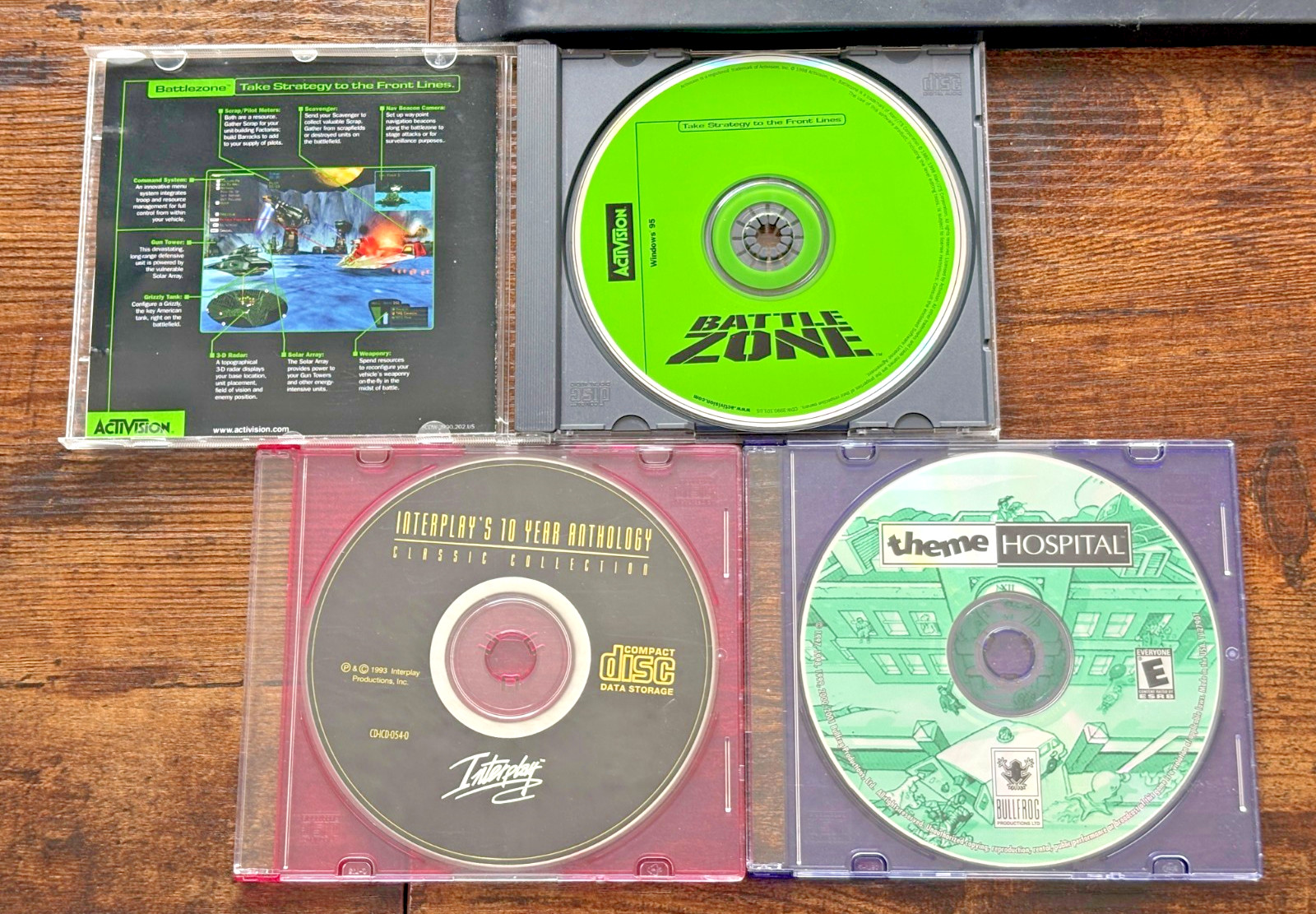3 PC CD games lot BattleZone 1998, Theme Hospital, Interplay's 10 Year Anthology