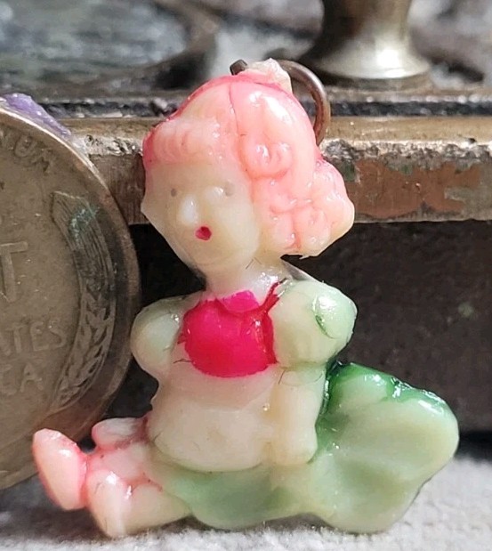 Vintage Celluloid LITTLE GIRL IN GREEN DRESS charm prize jewelry 