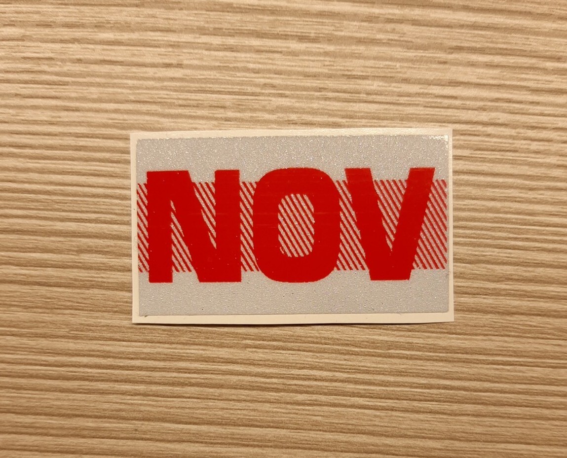 November, California DMV license plates month sticker tags. RED. YOM