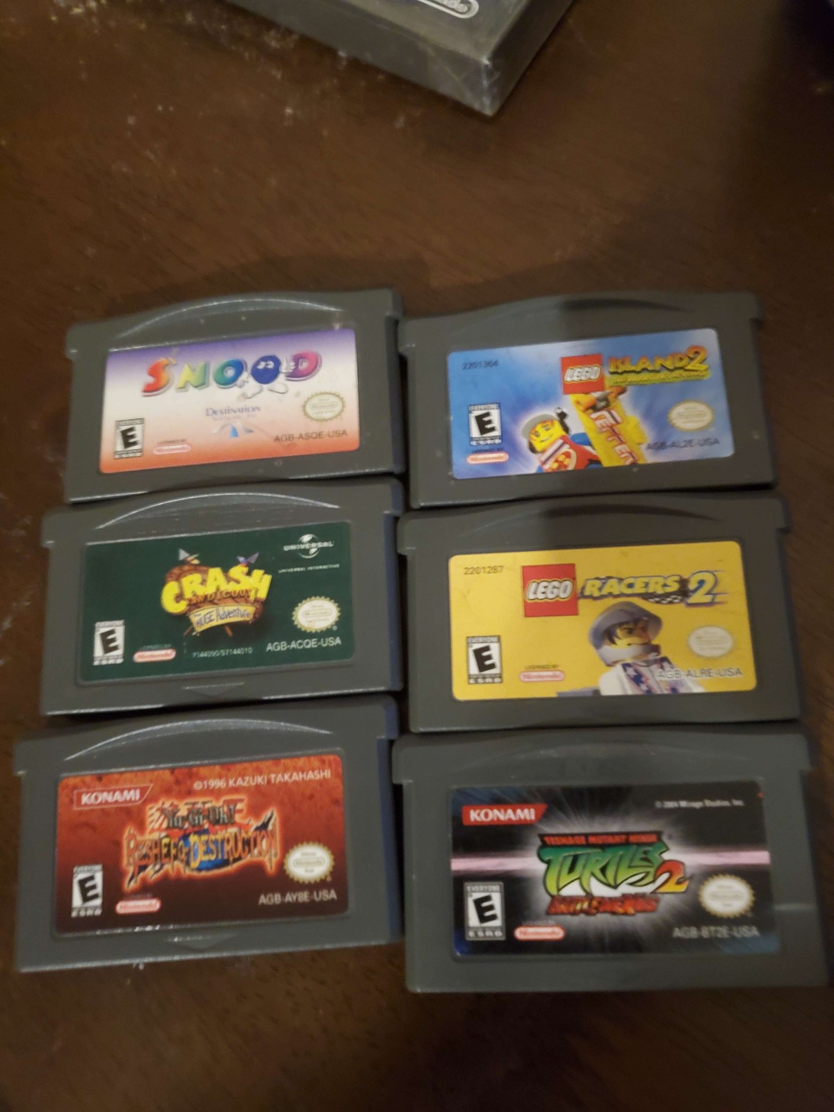 Game Boy Advance 6 game lot - Lego Racers&Island, Yugioh, Crash, TMNT, Snood.