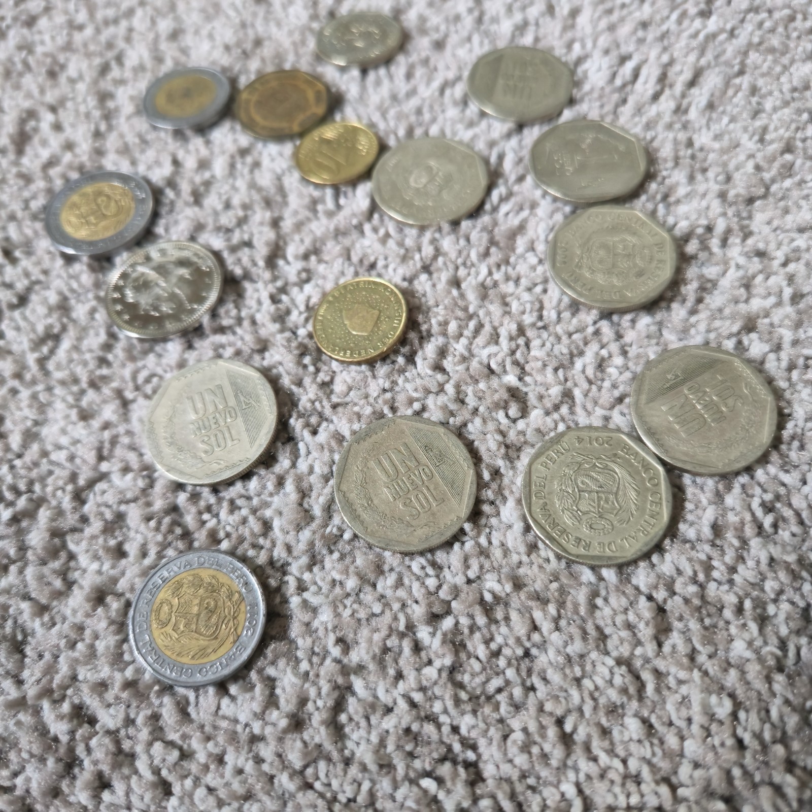 Peruvian Soles (PEN) from various years, including the 