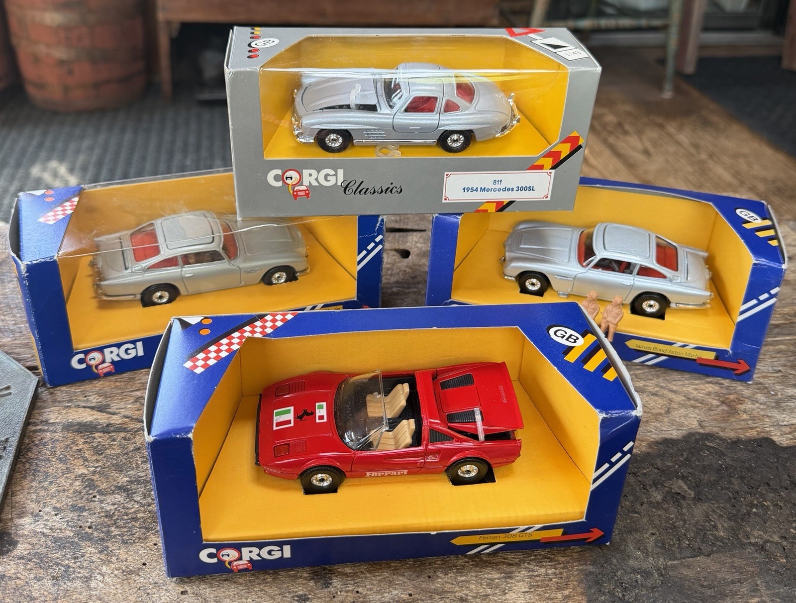 4 Corgi Die-Cast Cars, 1984/86 James Bond Aston Martin, Plus Ferrari & Mercedes