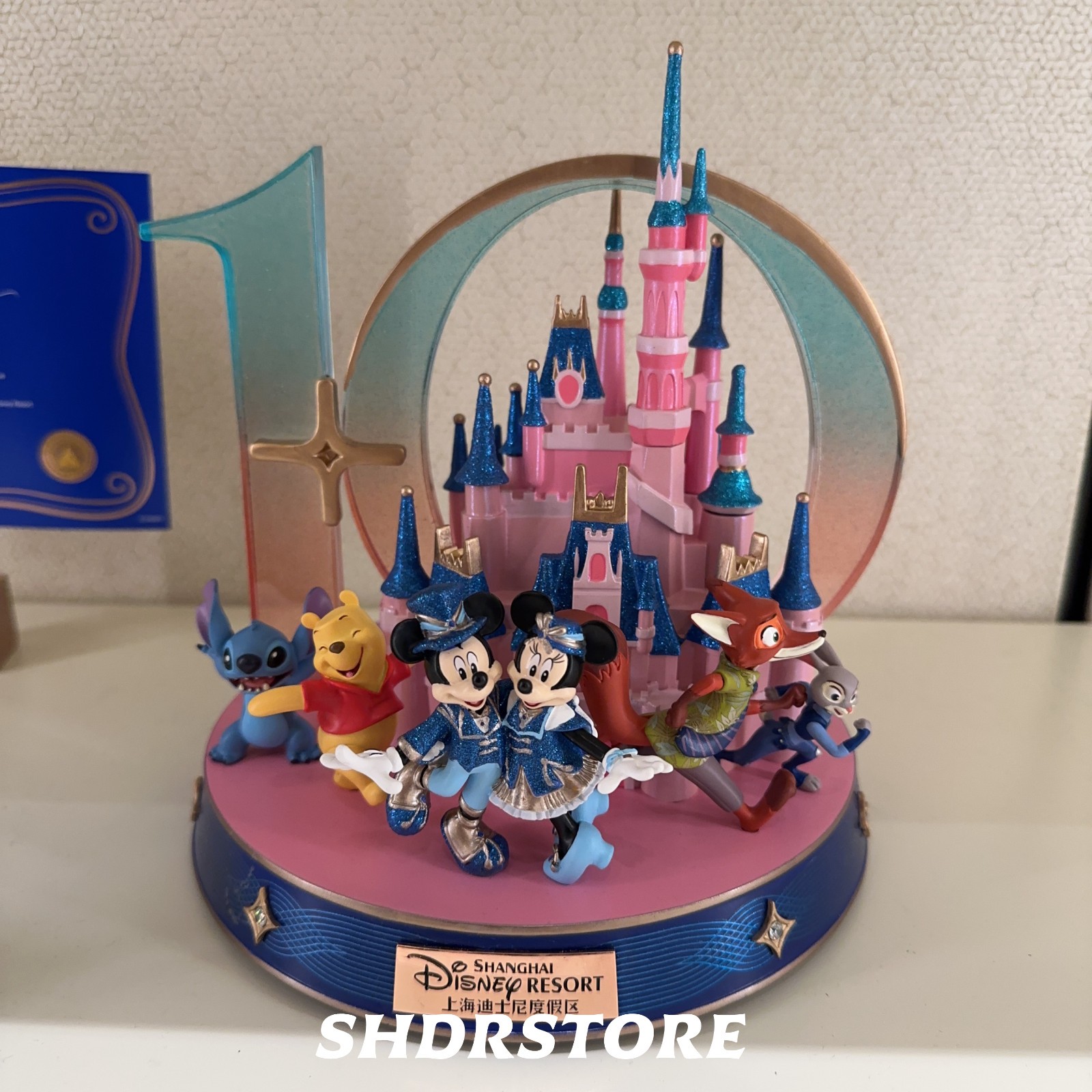 Disney 2026 shanghai 10th anniversary Mickey mouse Zootopia pooh castle statue