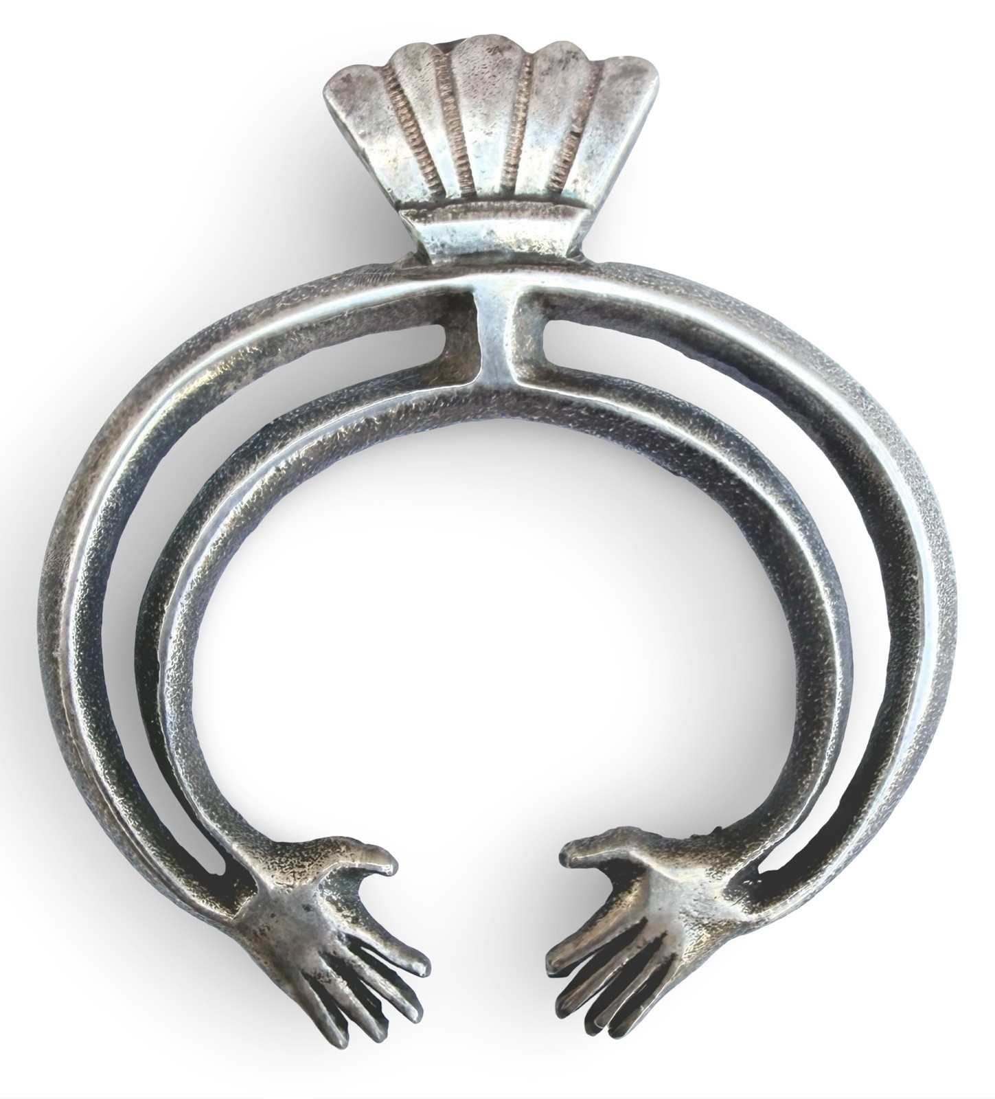 Early 20th Century Navajo Tufa Cast Silver Naja Pendant w/ Hands