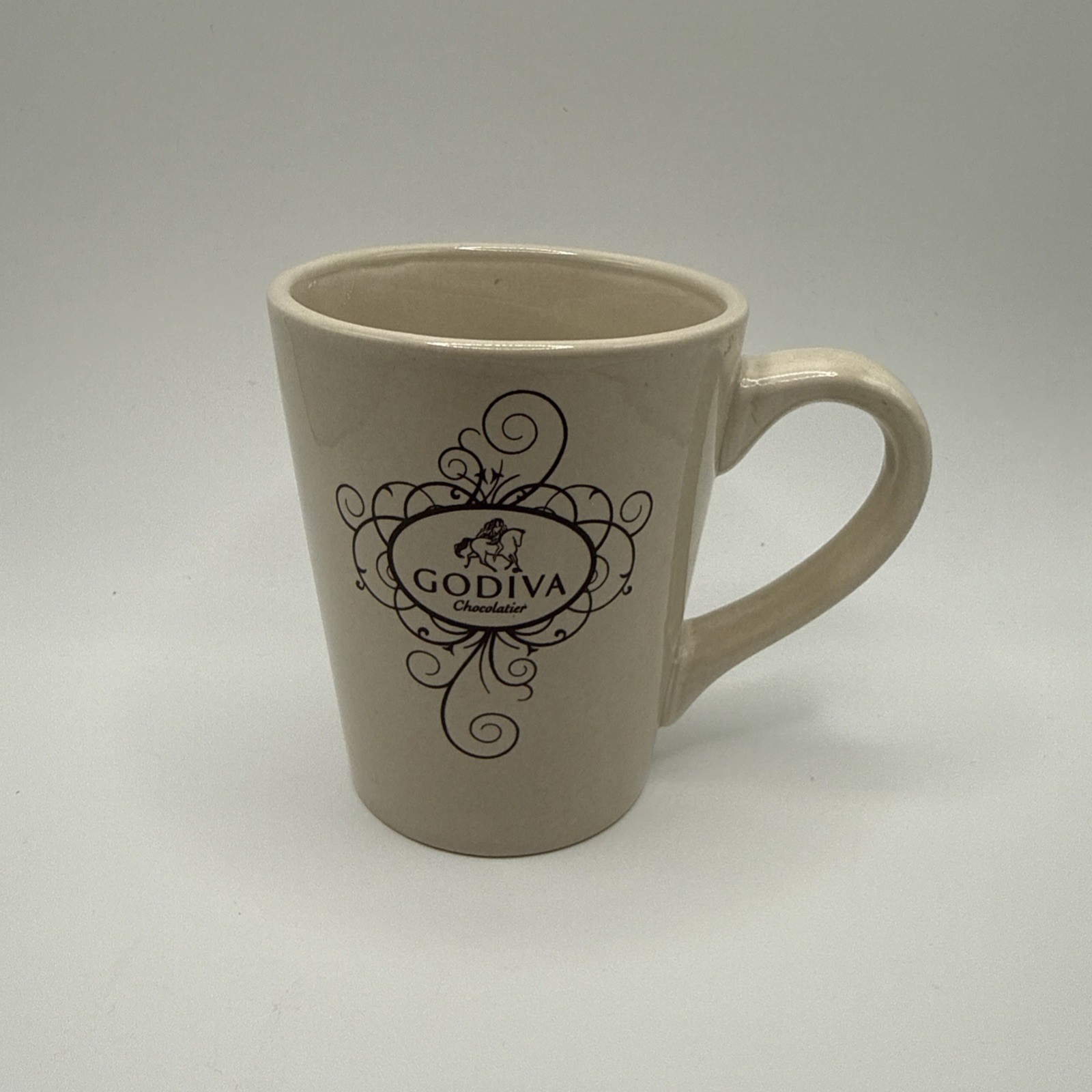 2010 Godiva Chocolatier California Pantry Lady Godiva Scroll Coffee Mug Cream
