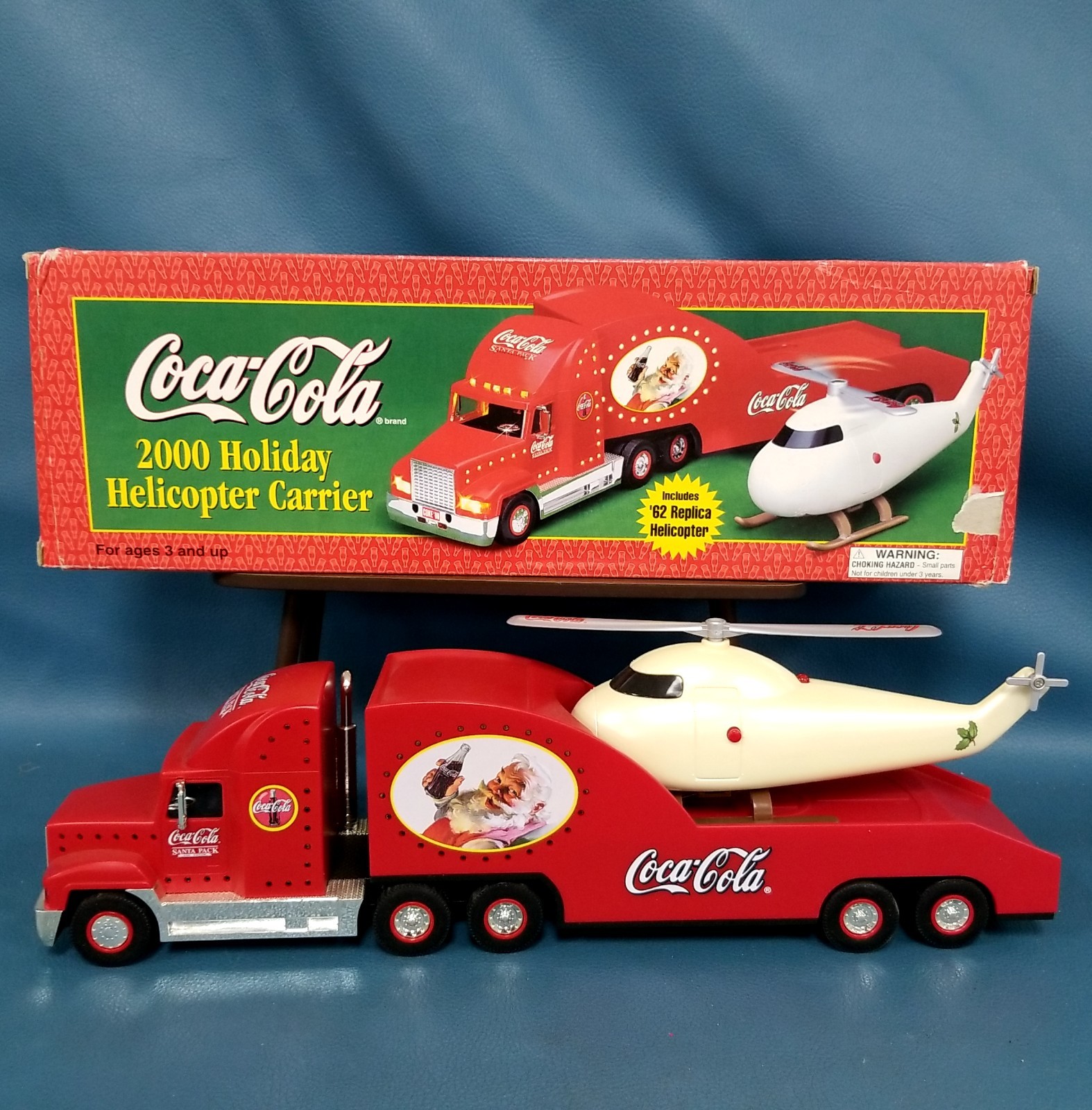 New/Open Box Coca-Cola 2000 Holiday Helicopter Carrier 1962 Replica Copter