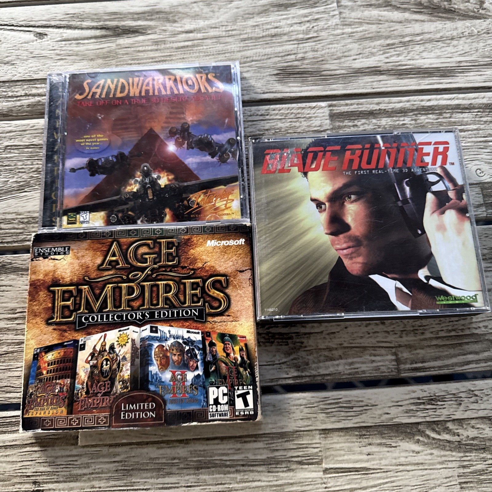 3 PC Game lot: Blade Runner 1997 (Complete), SANDWARRIORS, Age Of Empires Coll