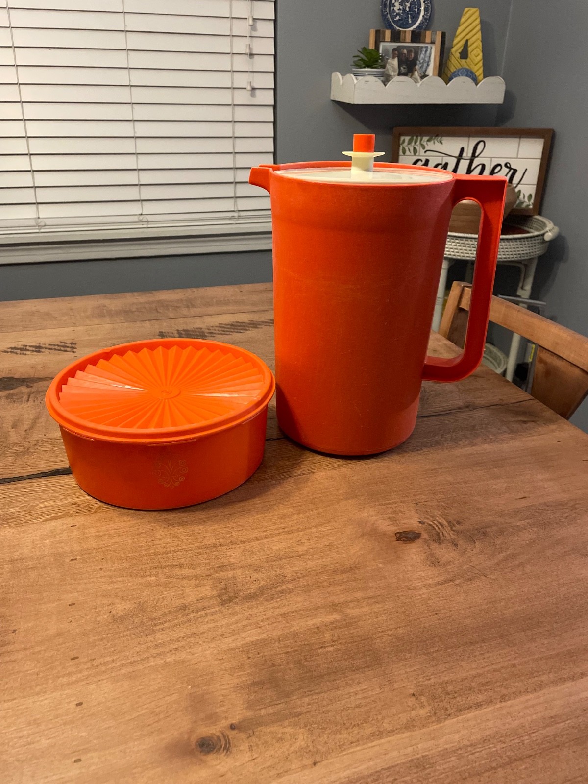 Vtg tupperware orange pitcher and push top round canister