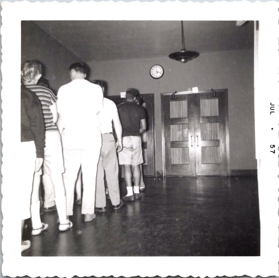 Young Men in Queue Inside Hall, 1957 Vintage B&W Snapshot Photo
