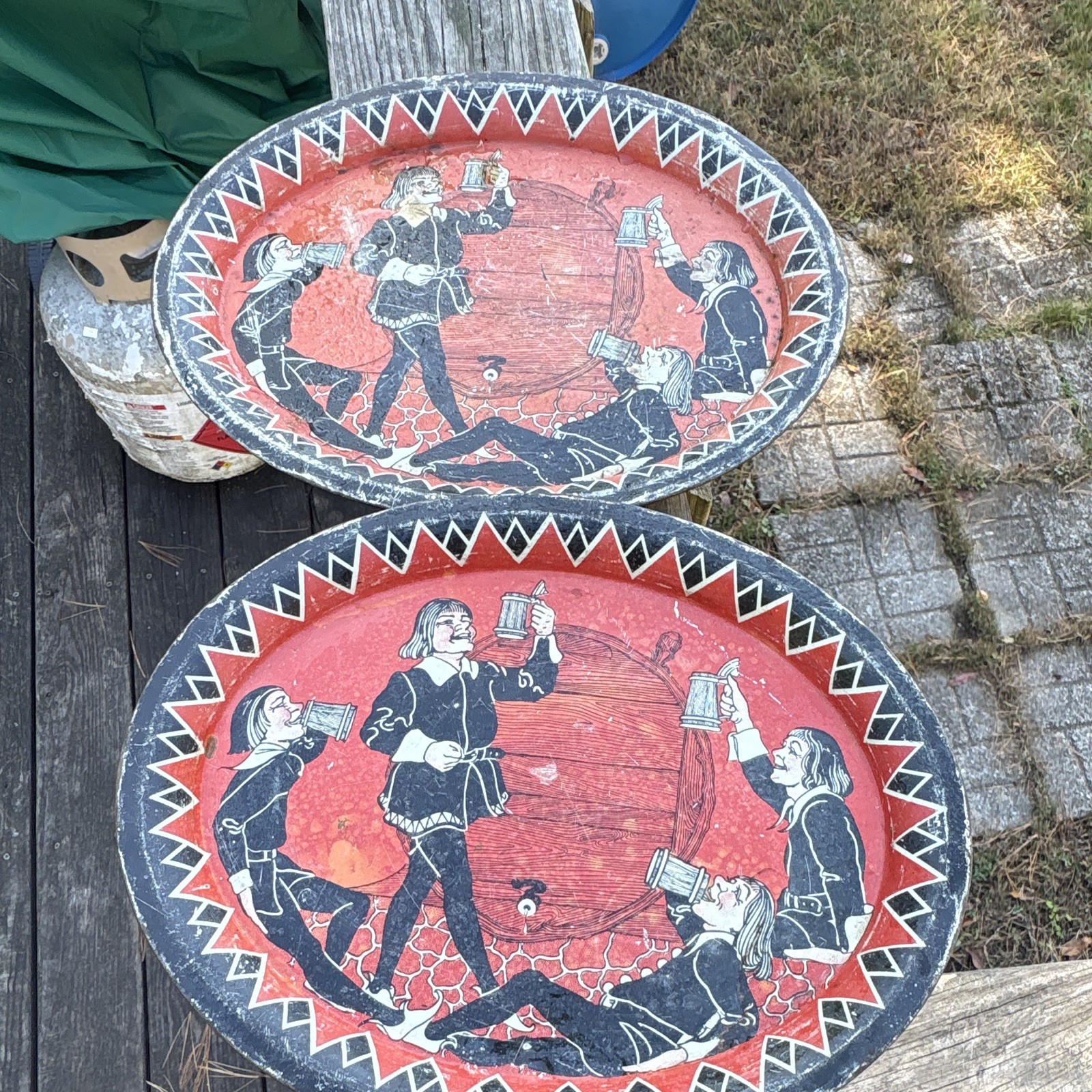 This is a  Set Of 2 vintage 1930s Bavarian beer hall metal serving tray