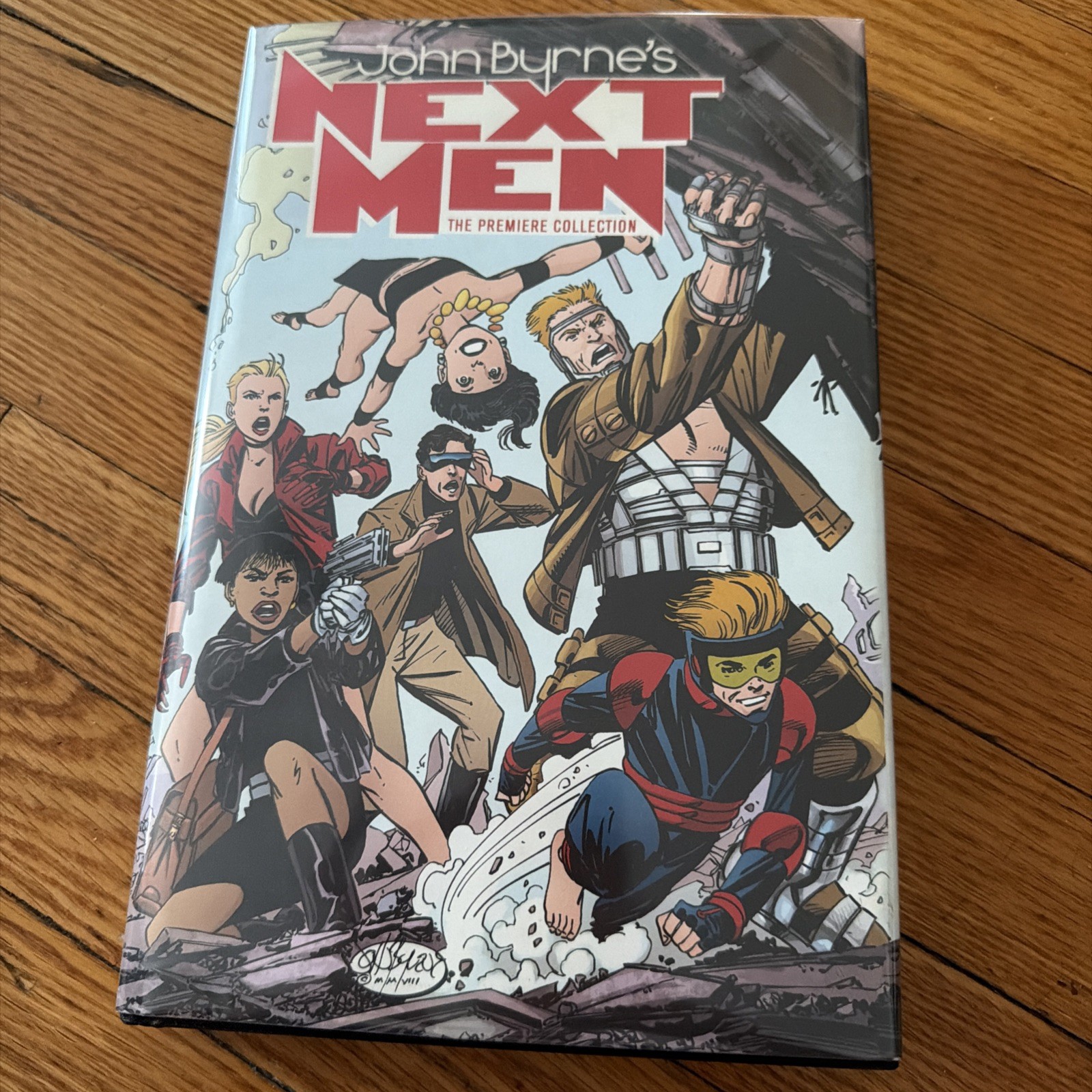 NEXT MEN: PREMIERE EDITION/VOLUME 1/John Byrne/IDW/Hardcover/Excellent