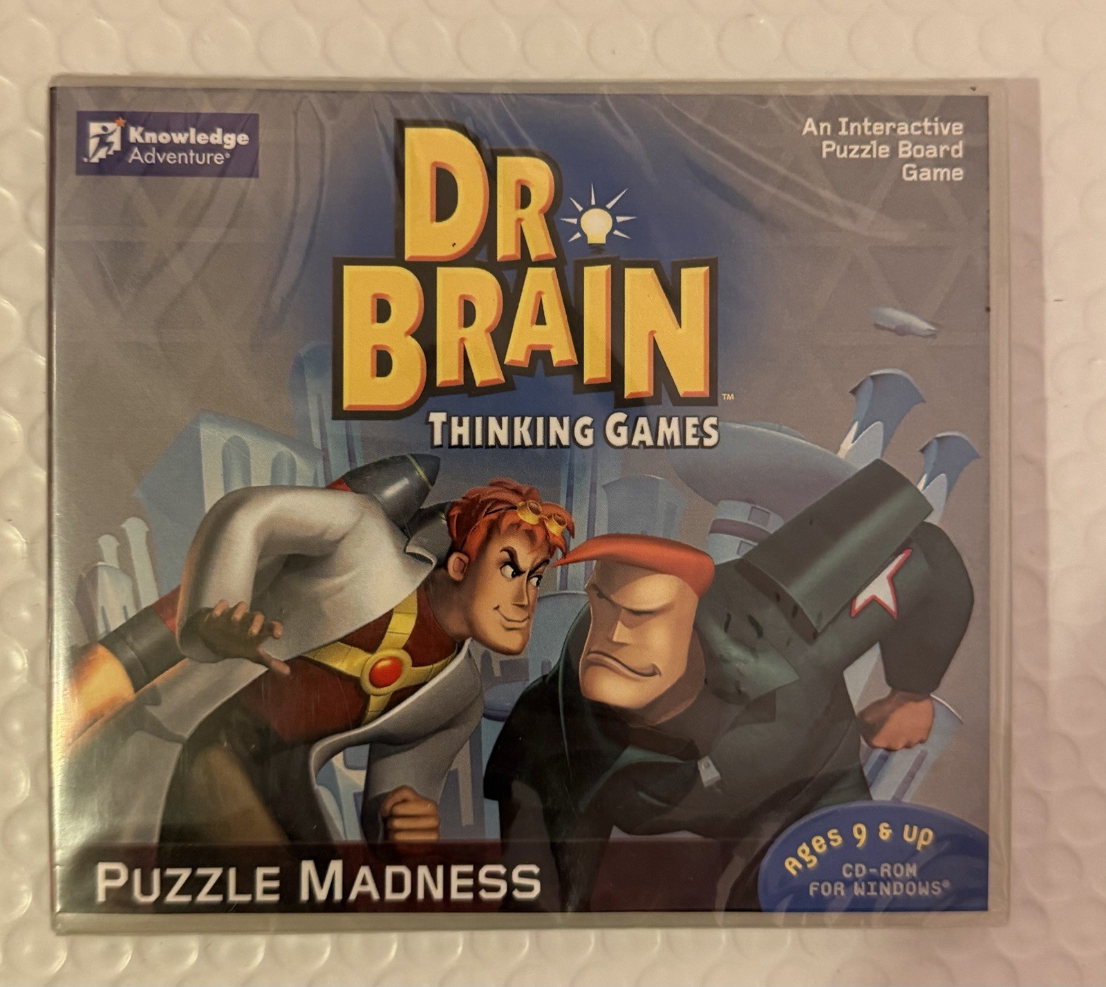 DR BRAIN PUZZLEOPOLIS PUZZLE MADNESS  ( CD ROM For Windows ) New And Sealed .