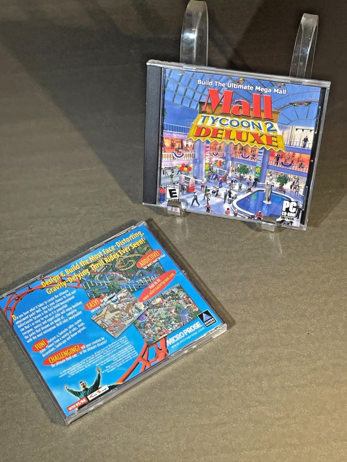 Roller Coaster Tycoon and Mall Tycoon 2 Deluxe NOTE (1924)