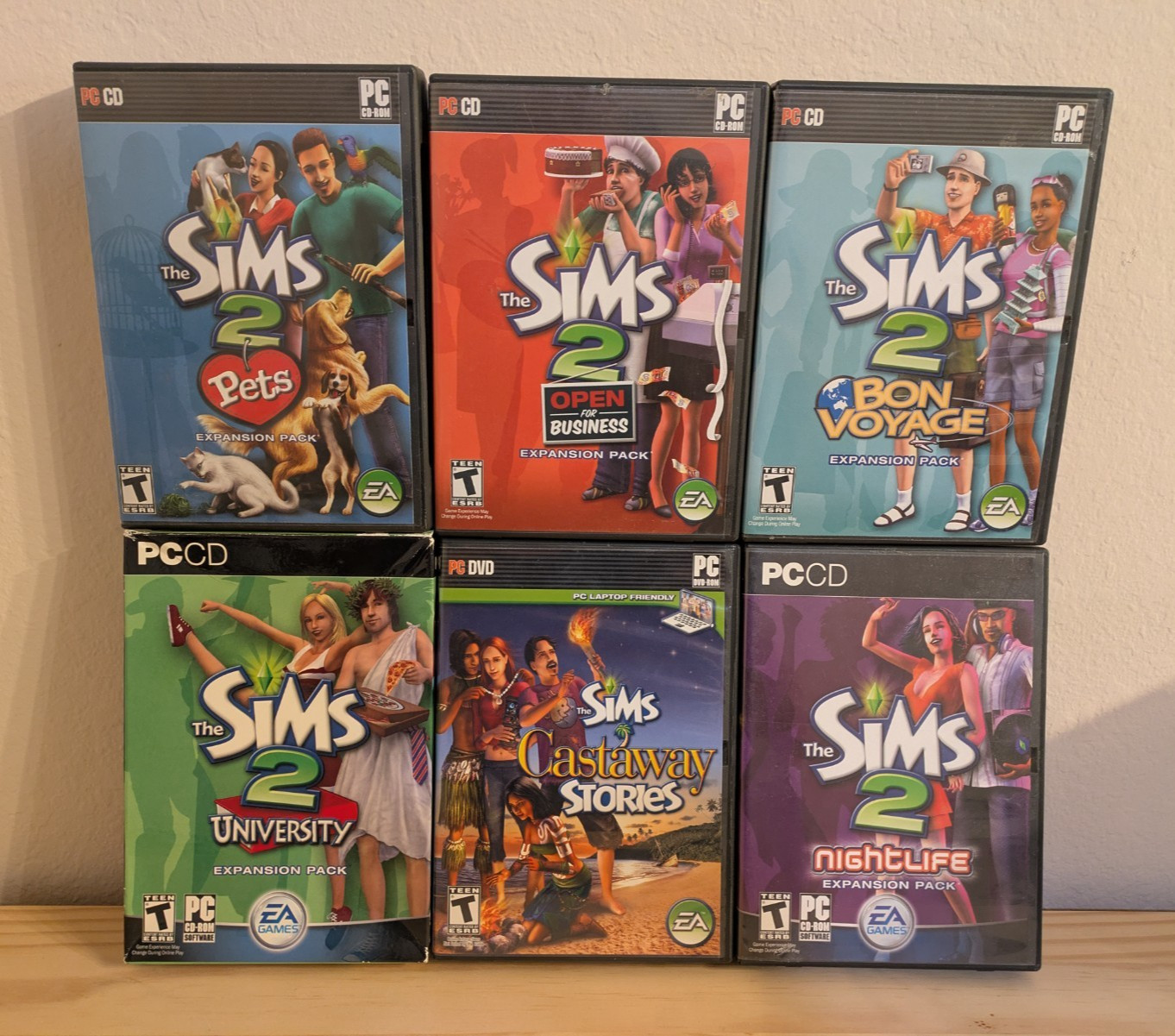 The Sims 2 PC Expansion Packs w/ Manuals, Serial # + Castaway Stories - Lot of 6