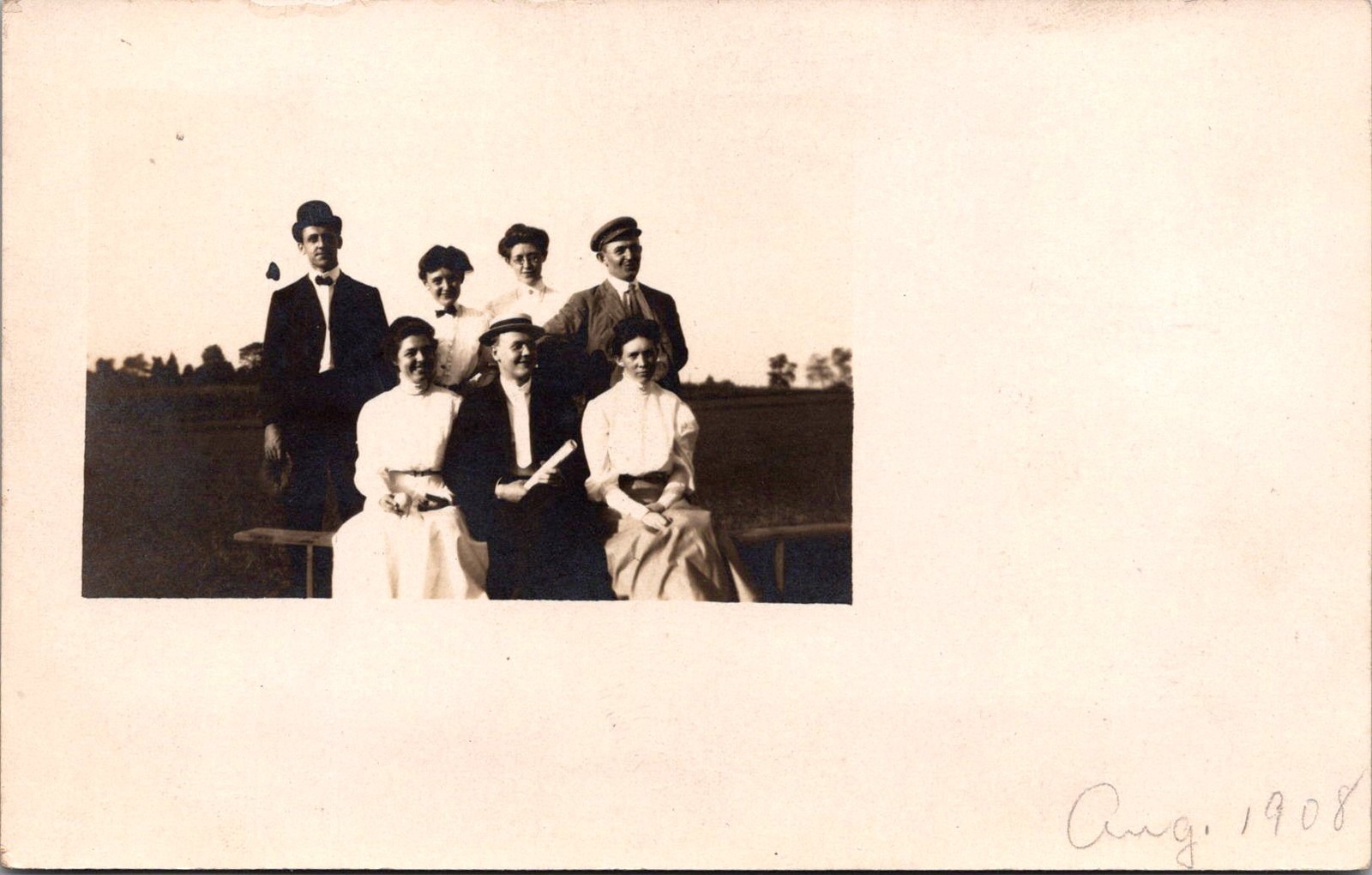 1908 RPPC Outdoor Group Portrait Seven People Vintage Postcard 4P24-23