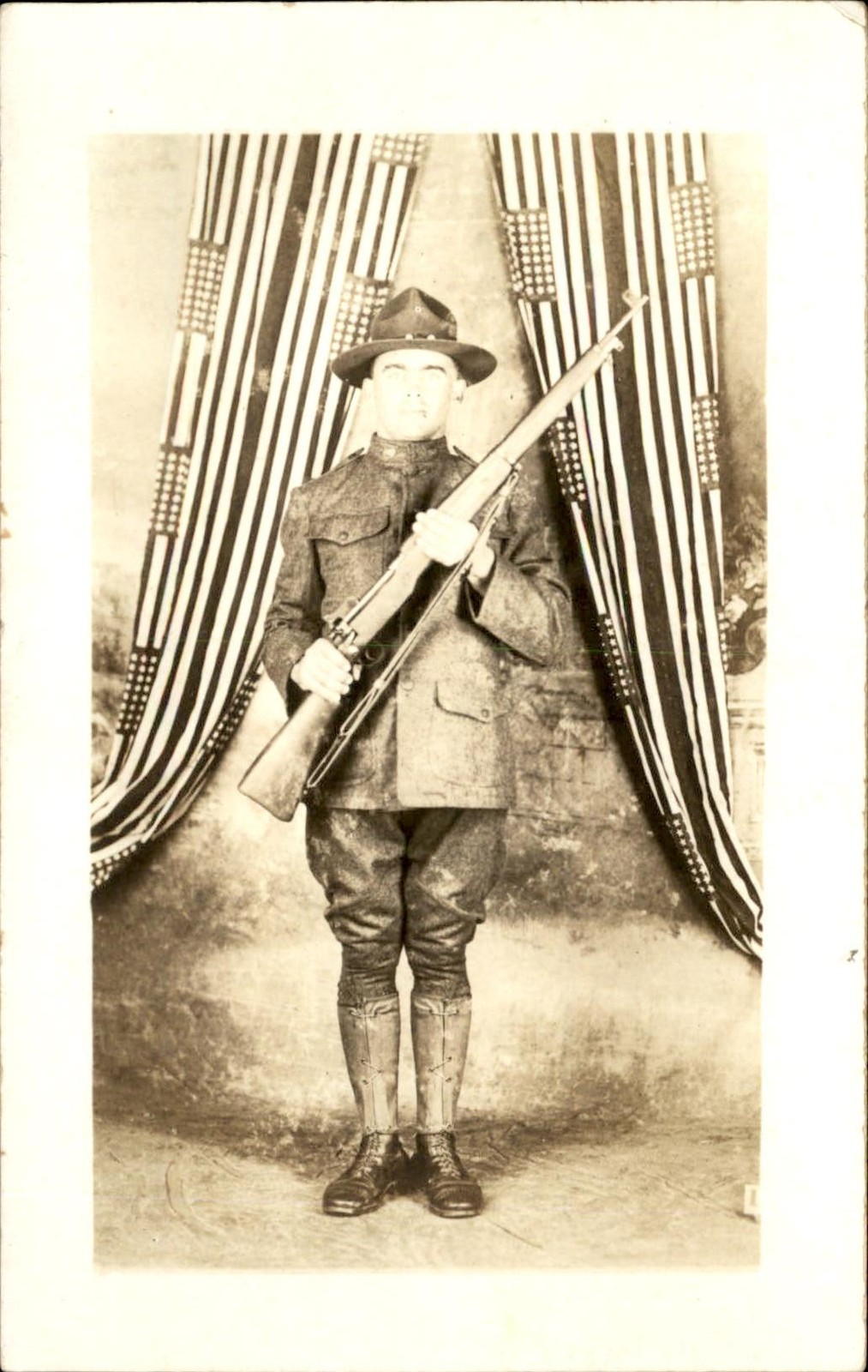 WWI US Army Soldier Studio Image American Flag Bunting Rifle Gun c1918 RPPC