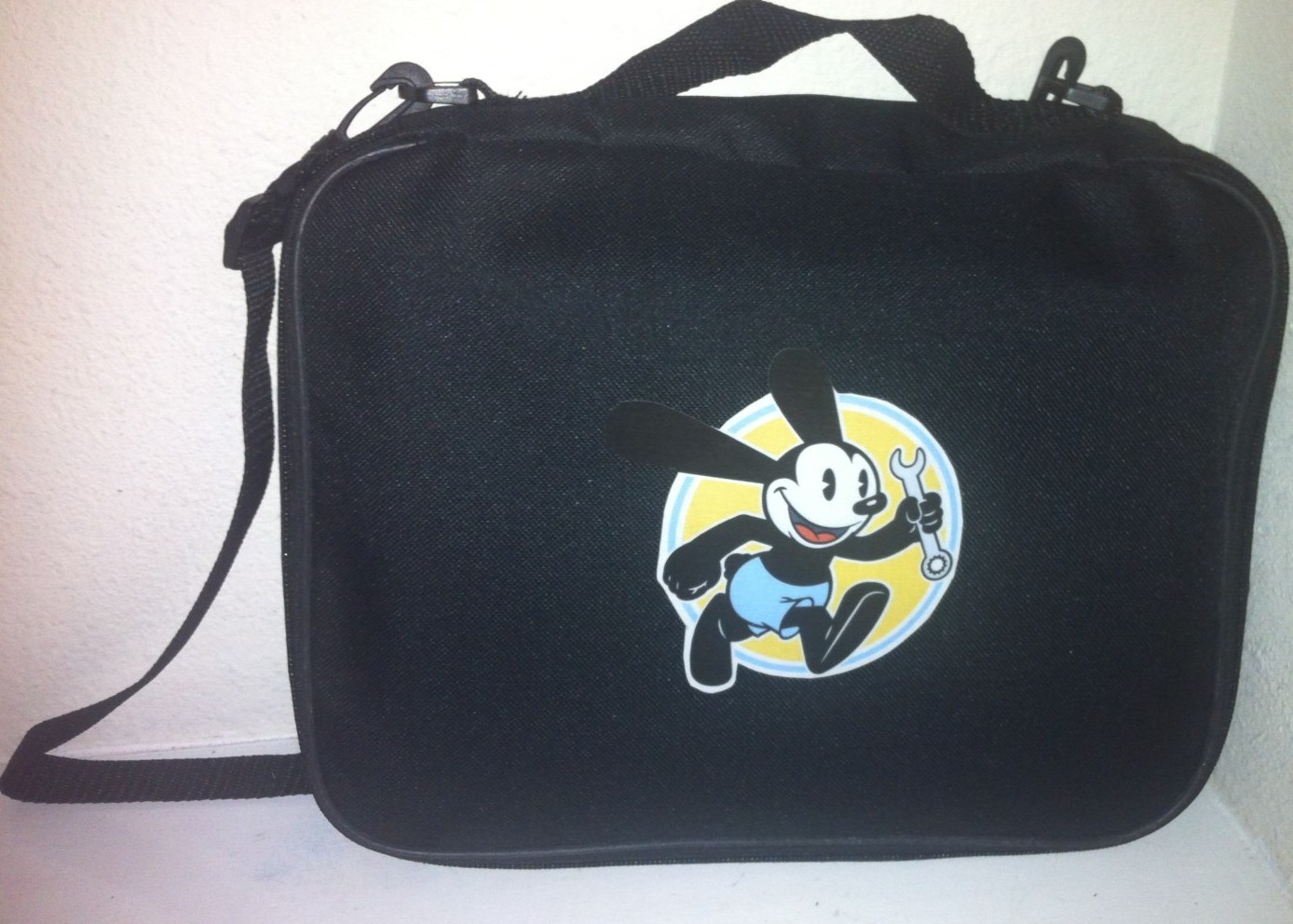 TRADING PIN BAG FOR DISNEY PINS  OSWALD THE LUCKY RABBIT WITH WRENCH  Book CASE