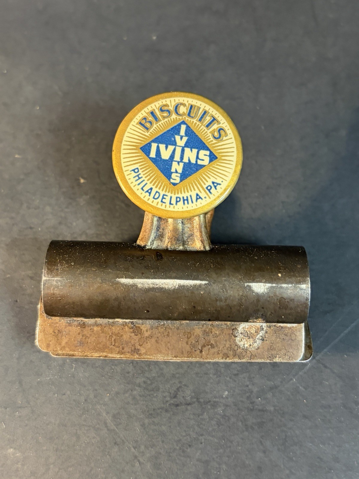 Antique Celluloid Ivins Biscuits Philadelphia Advertising paper clip clamp