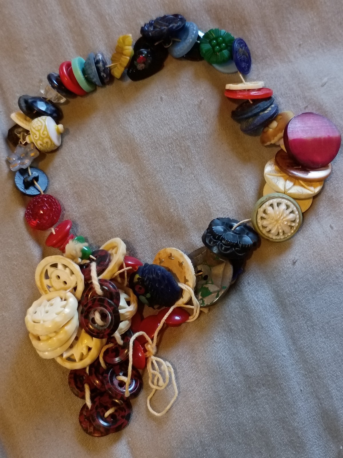 Vintage String Of Plastic Buttons With Three Sets Of Dangles.