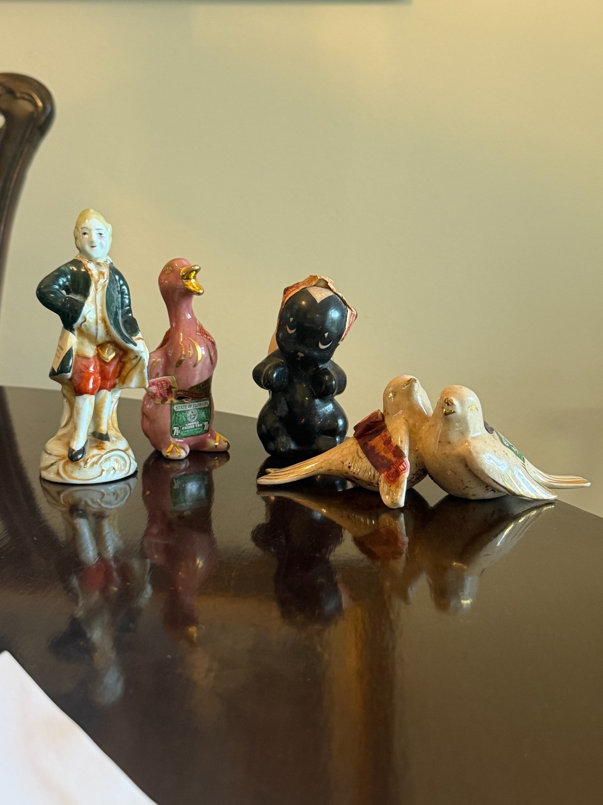 4 Vintage Ceramic Mini Liquor Bottles (Empty). Some with Tax Stamps