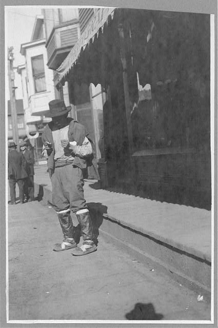 Photo:Nome Alaska Commercial Street Man Outside Store 1900s