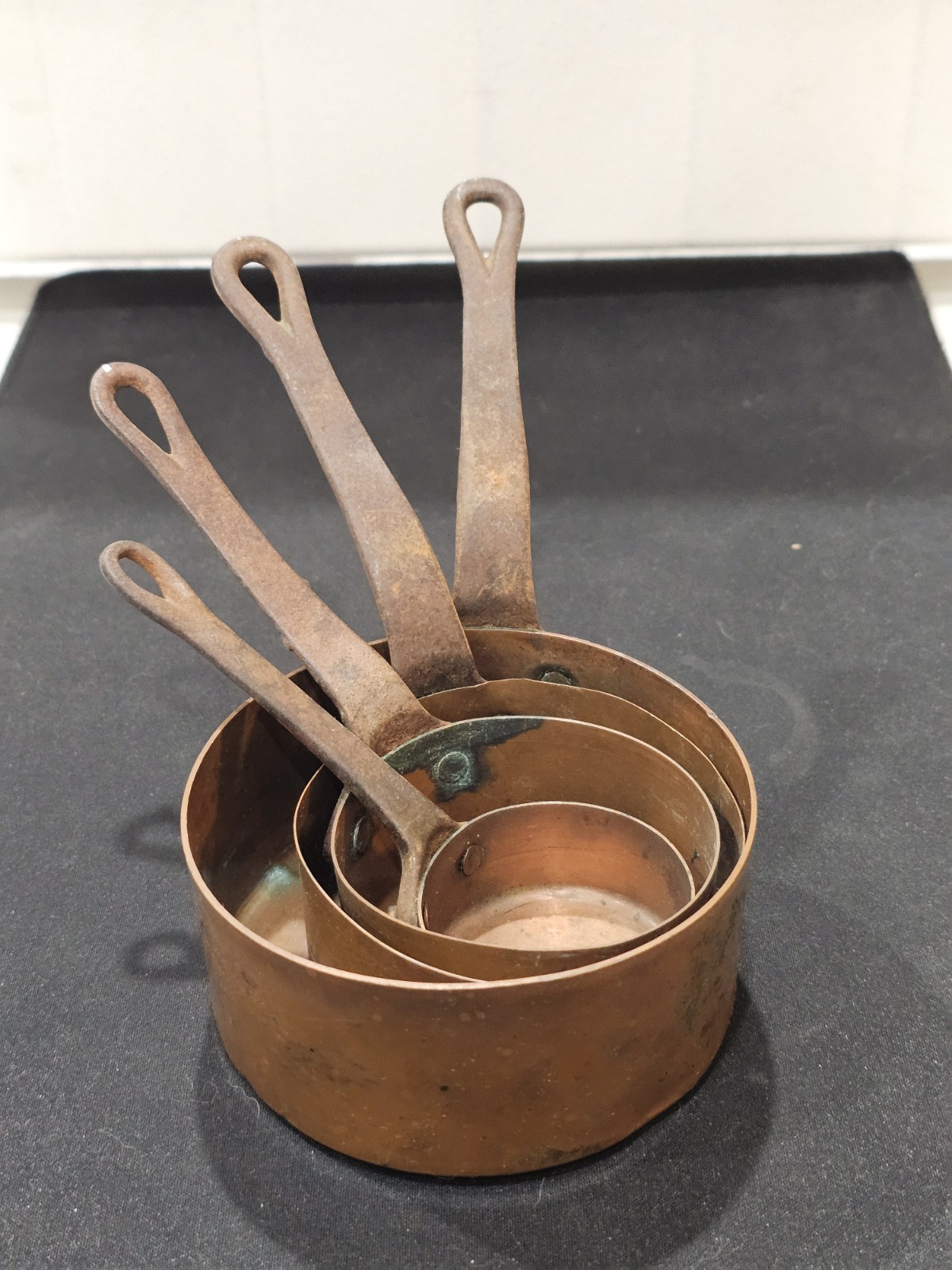 A Set of 4 Vintage French Small Copper Saucepans A lovely Decorative Set.