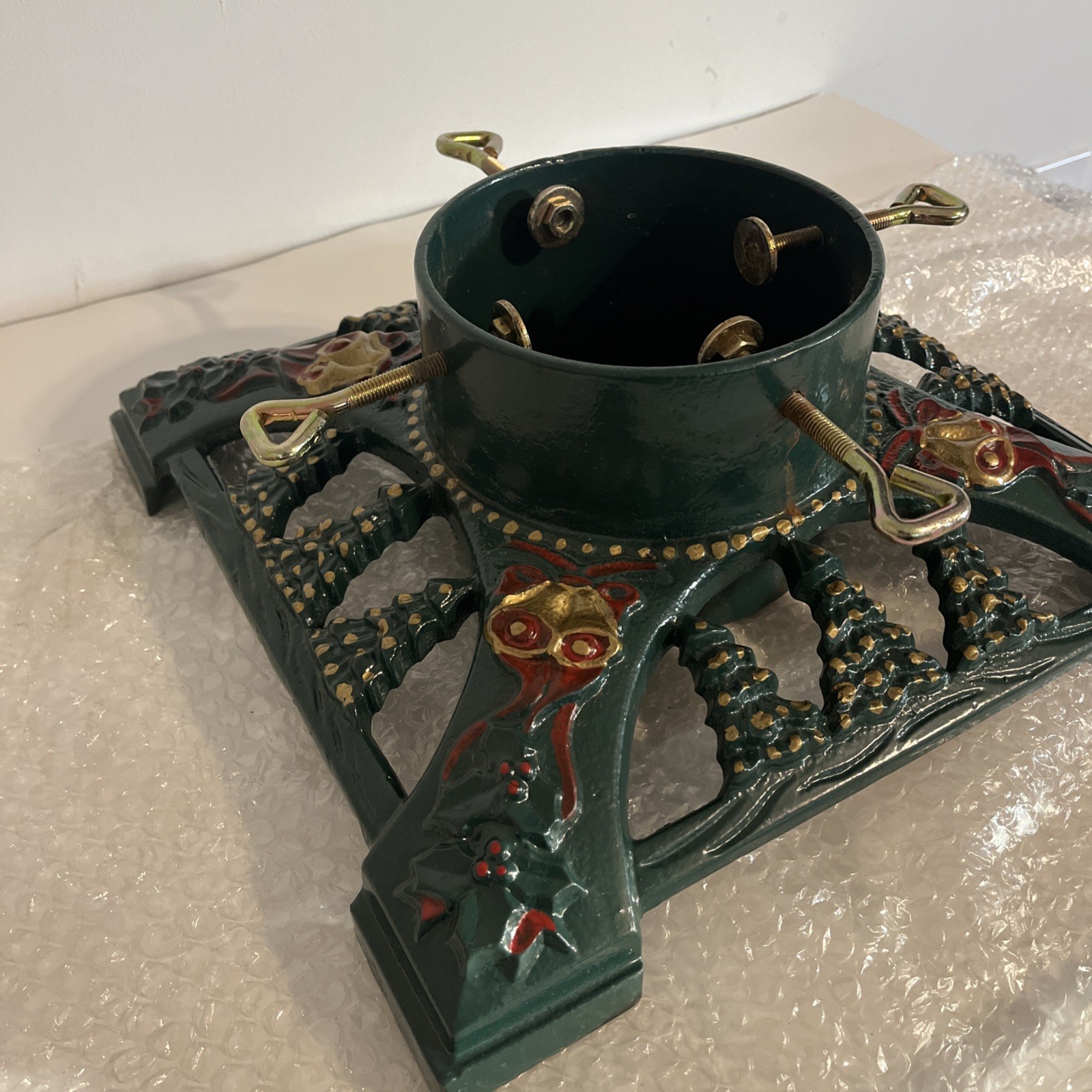 Vintage Innova Green Christmas Tree Stand Cast Iron Gold Bells Red Bows 14” 